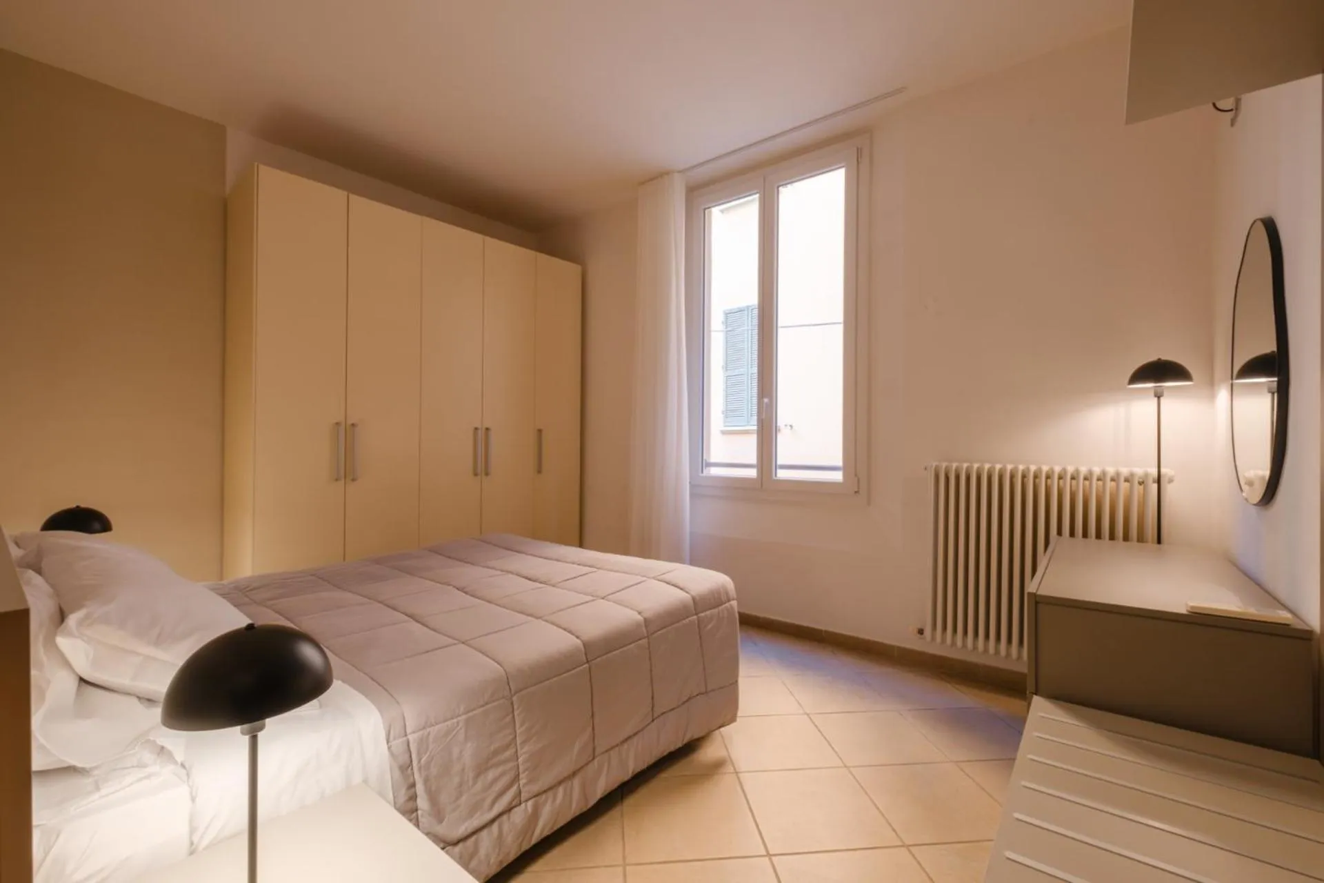 Bed in Residenza Ariosto by Studio Vita