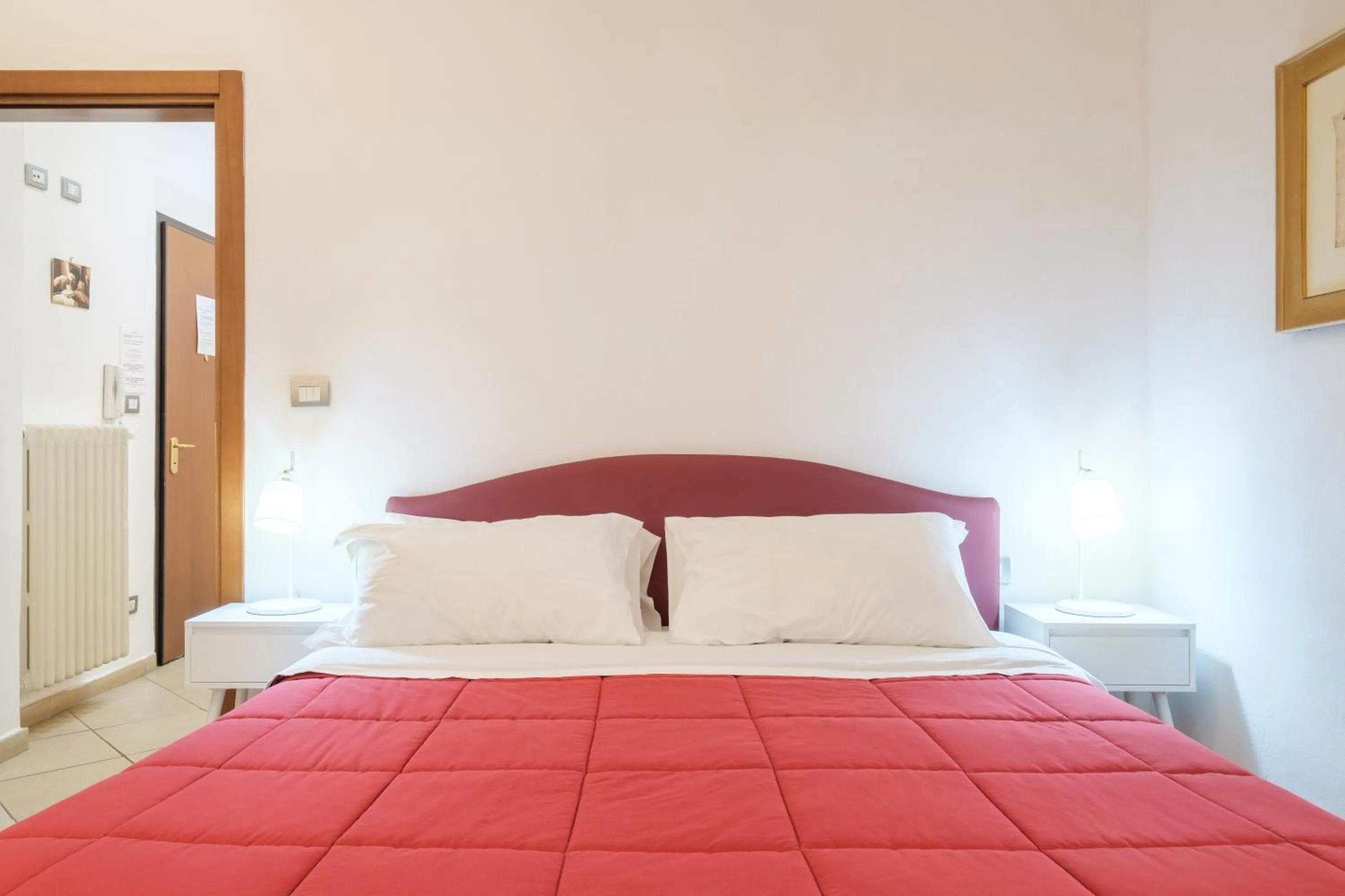 Bed in Residenza Ariosto by Studio Vita