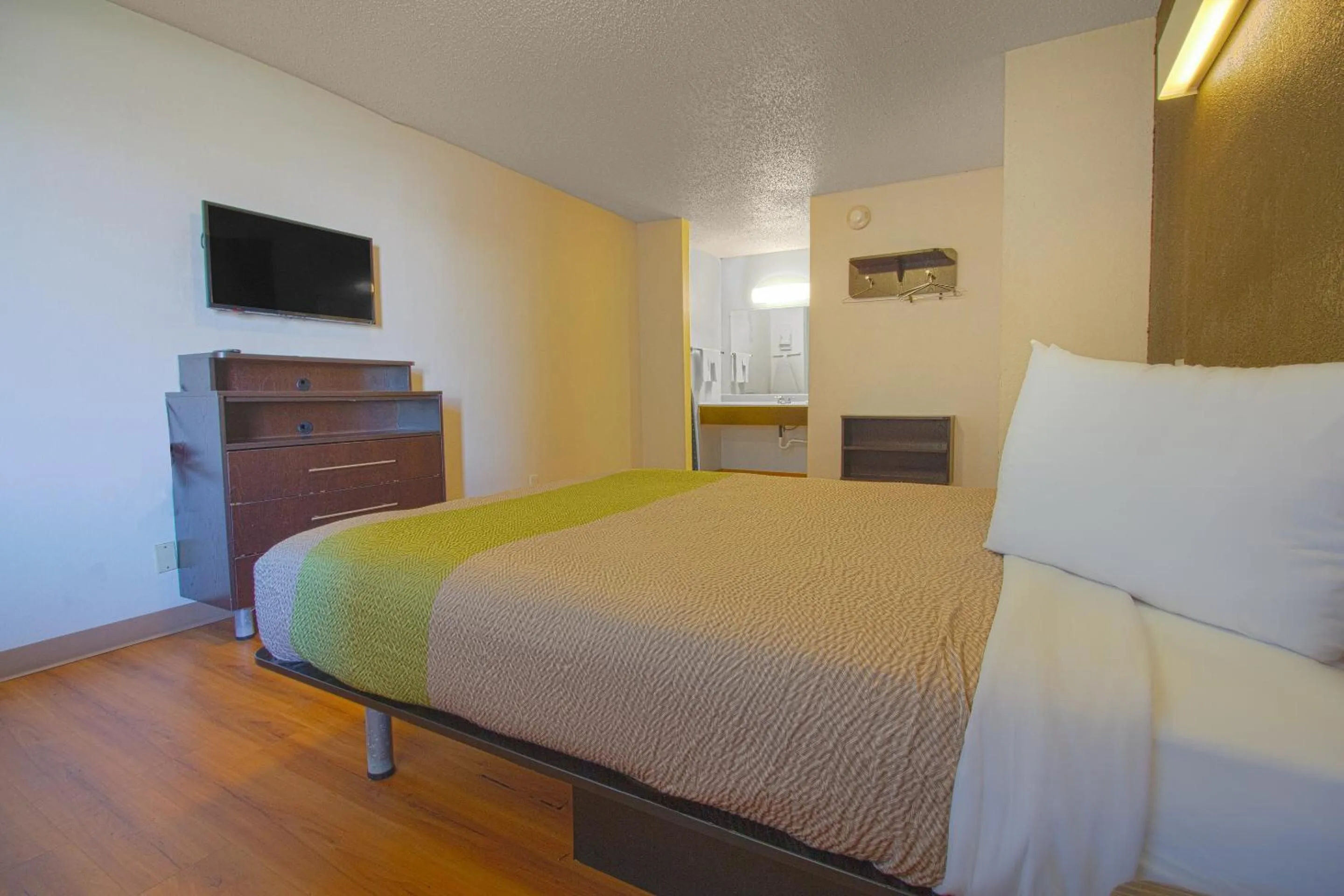 Bedroom in Studio Inn Extended Stay Oklahoma City Airport by OYO