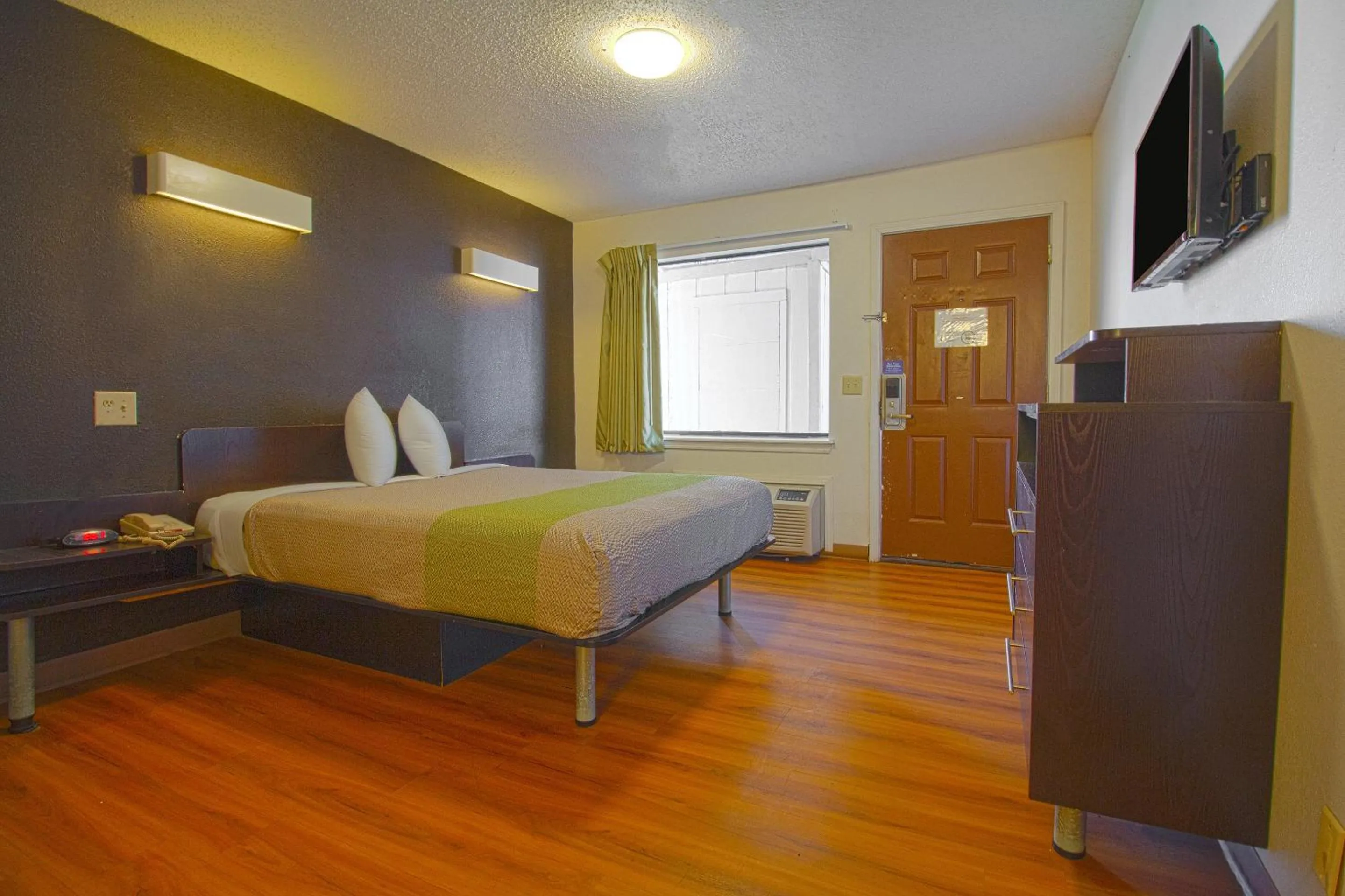 Bedroom in Studio Inn Extended Stay Oklahoma City Airport by OYO