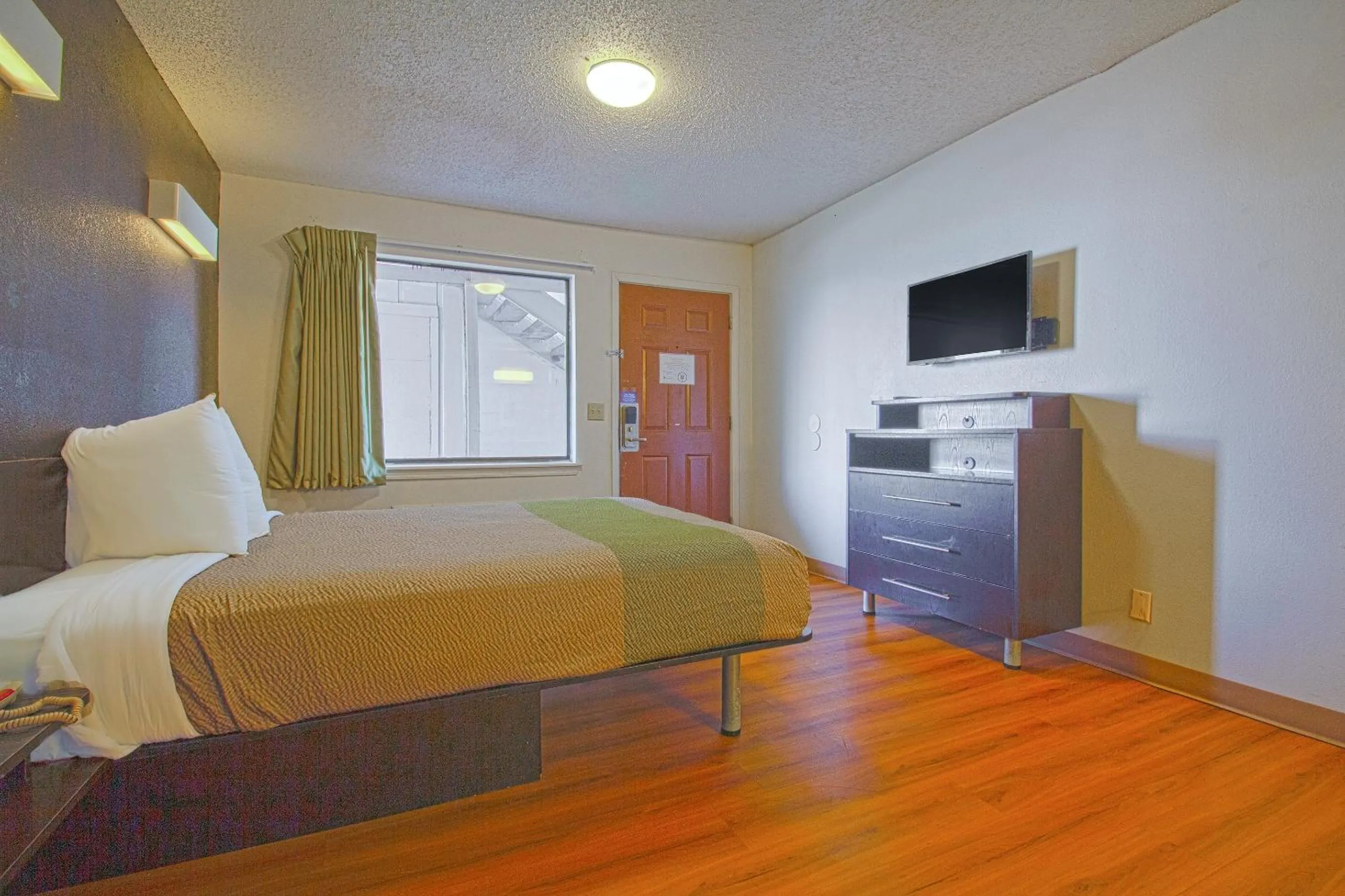 Bedroom in Studio Inn Extended Stay Oklahoma City Airport by OYO
