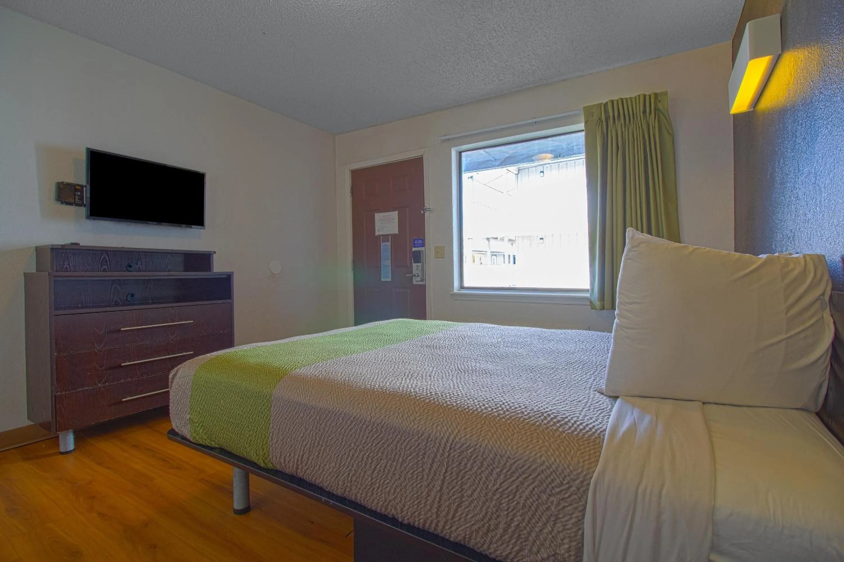 Bedroom in Studio Inn Extended Stay Oklahoma City Airport by OYO