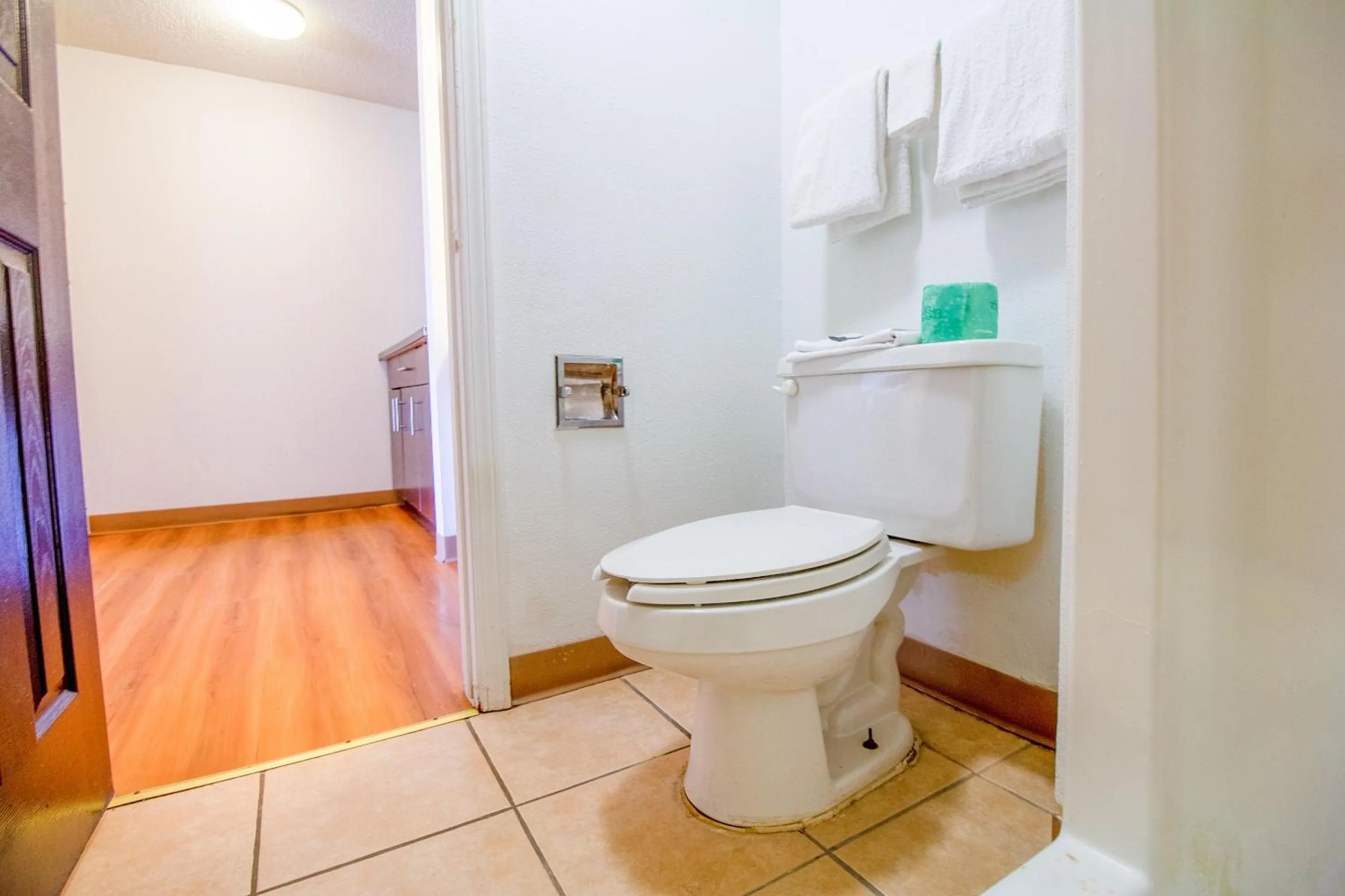 Bathroom in Studio Inn Extended Stay Oklahoma City Airport by OYO