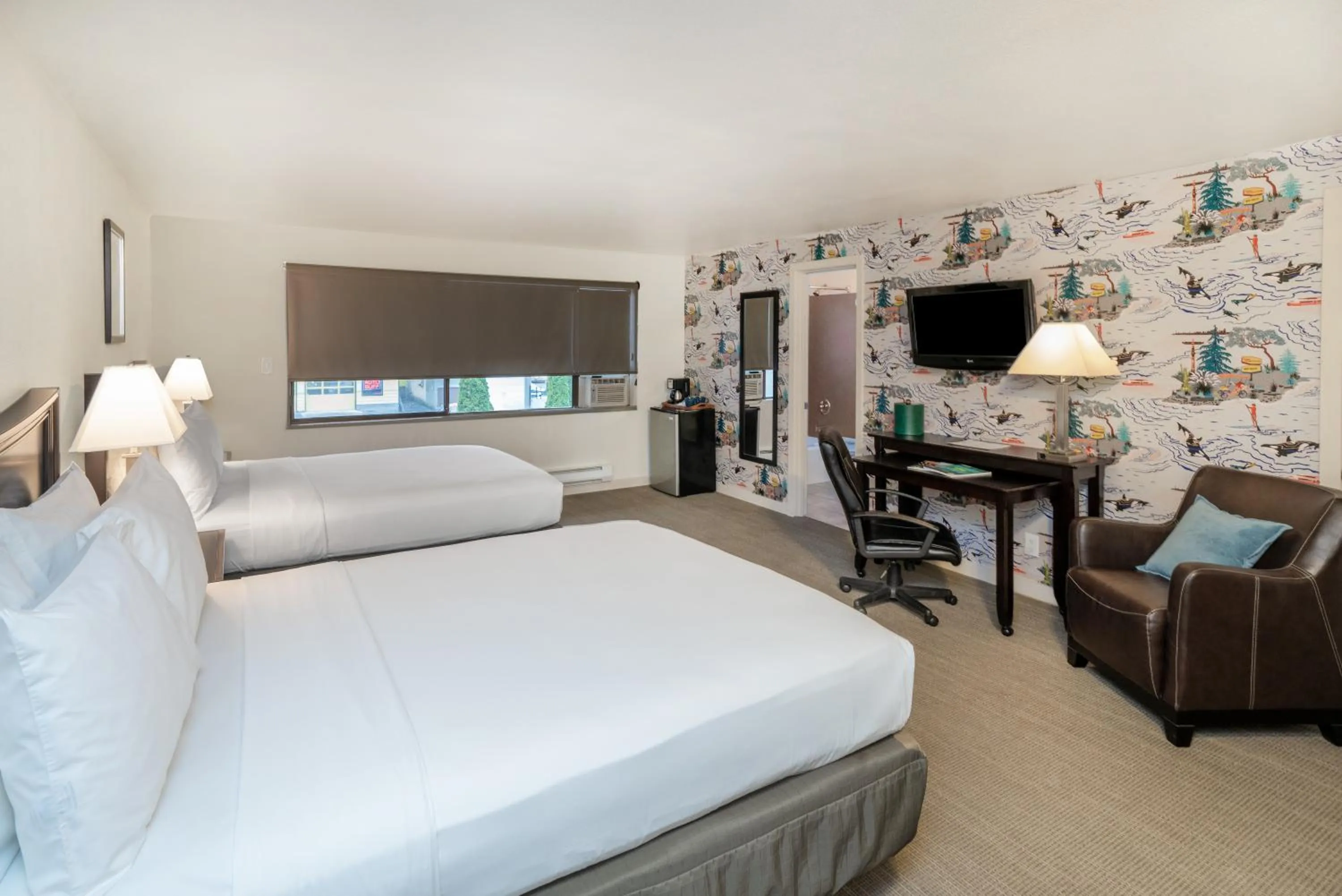 Bed in The Grove West Seattle Inn