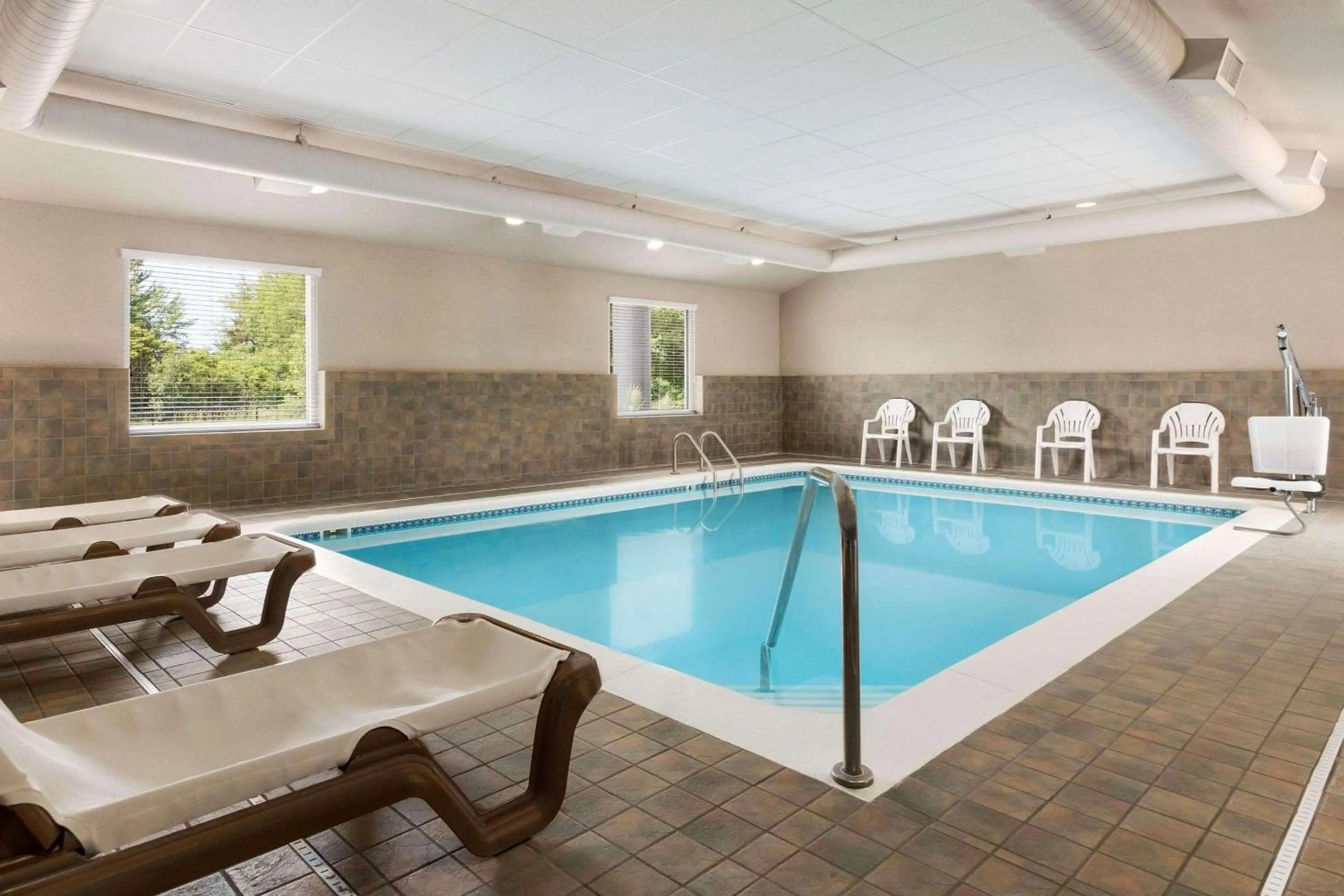 Pool view in Country Inn & Suites by Radisson, Holland, MI