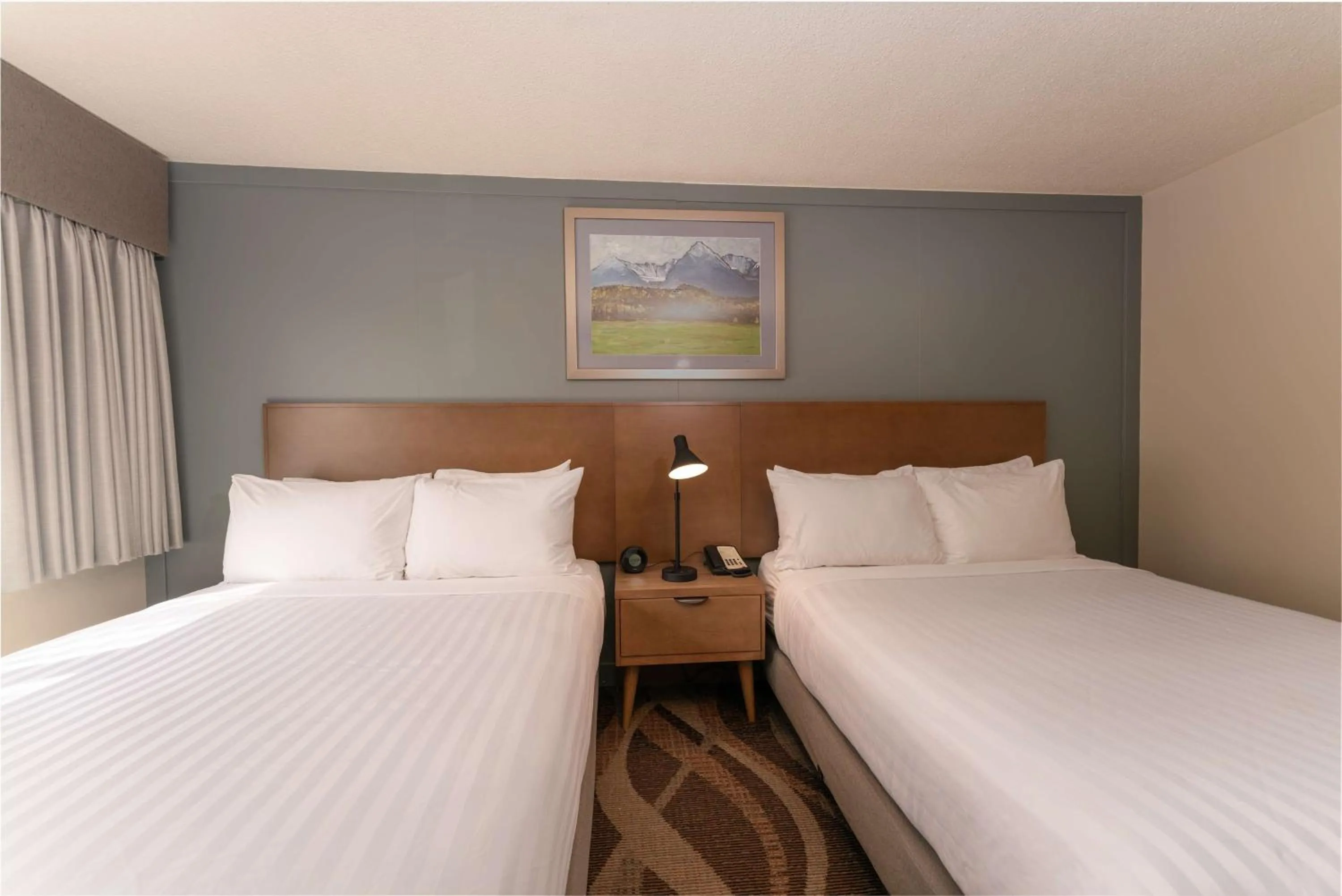 Bedroom, Bed in Prestige Hudson Bay Lodge & Conference Centre, WorldHotels Crafted Collection