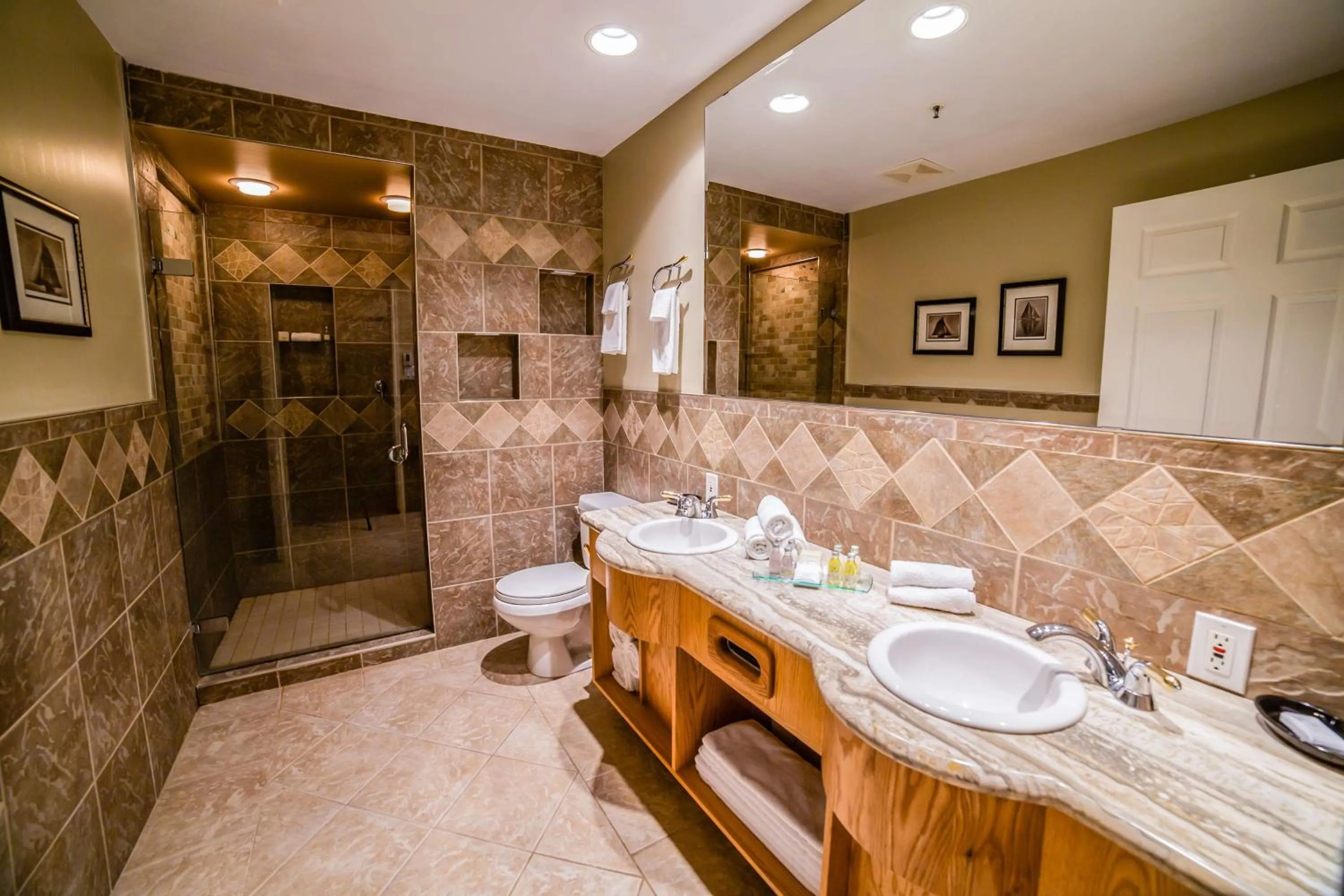 Bathroom in Prestige Hudson Bay Lodge & Conference Centre, WorldHotels Crafted Collection