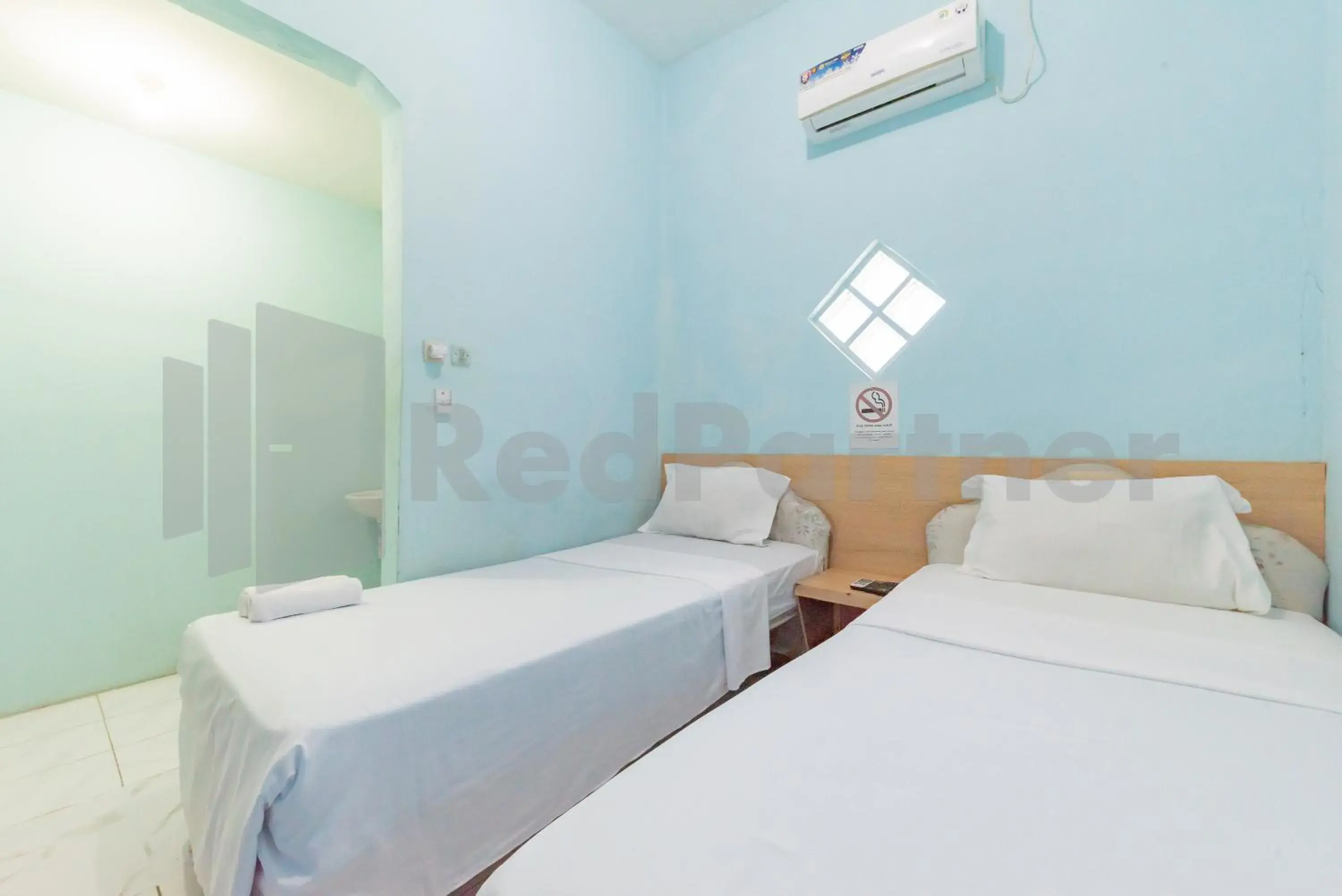 Standard Twin Room in Grha Blue Sky Syariah RedPartner Standard Twin Room in Grha Blue Sky Syariah RedPartner