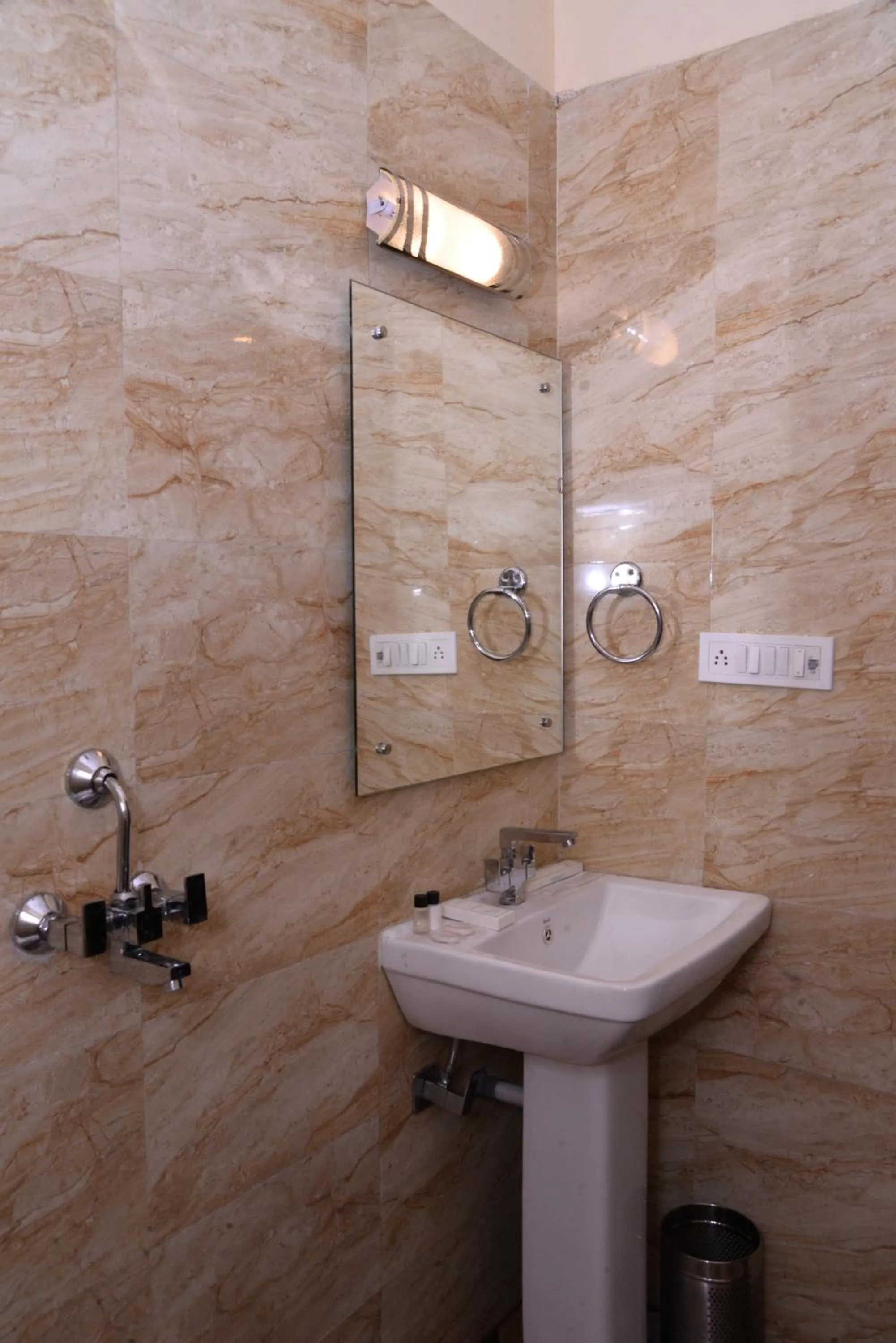 Bathroom in The Ravindram Hotel