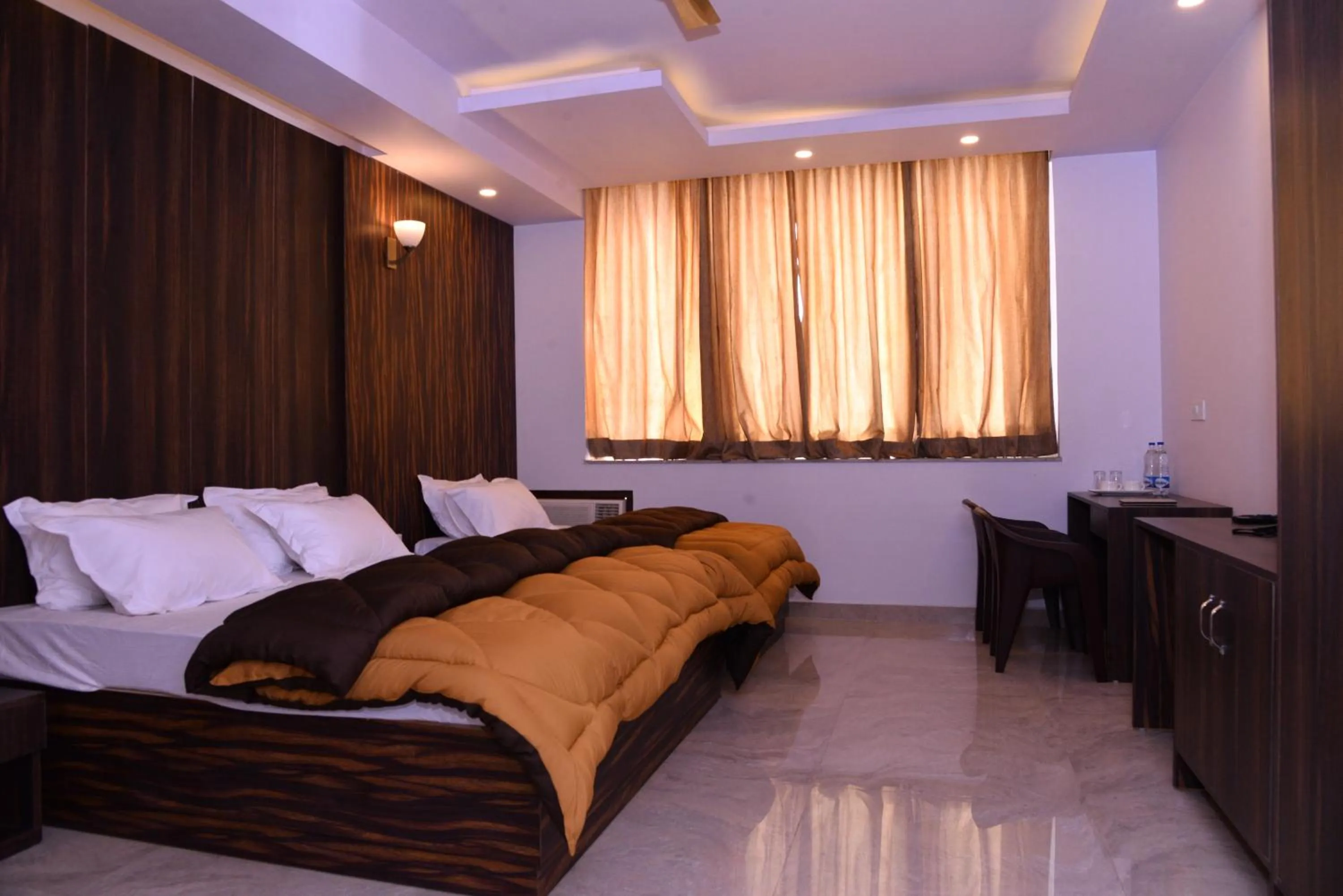 Photo of the whole room, Bed in The Ravindram Hotel