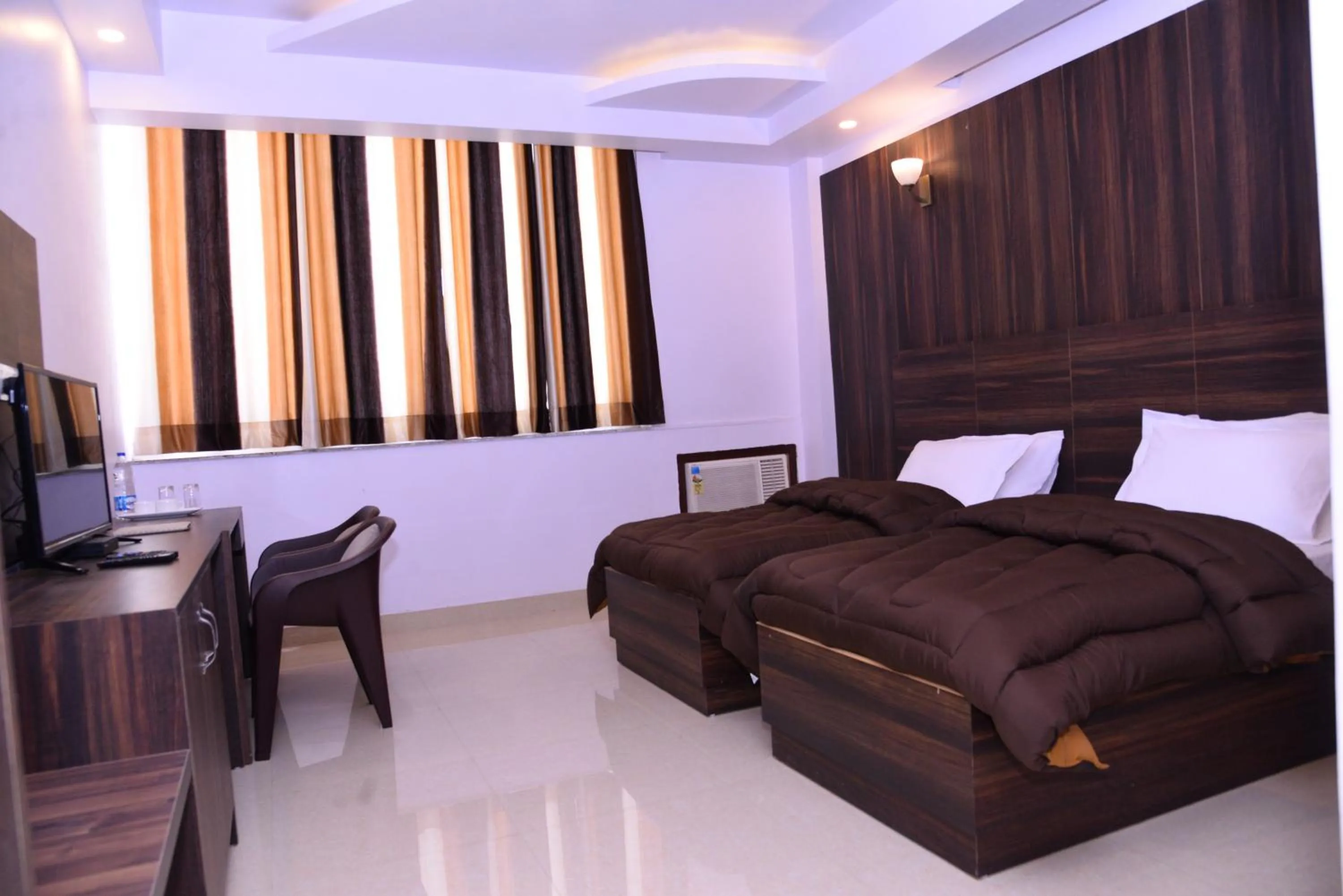 Photo of the whole room, Bed in The Ravindram Hotel