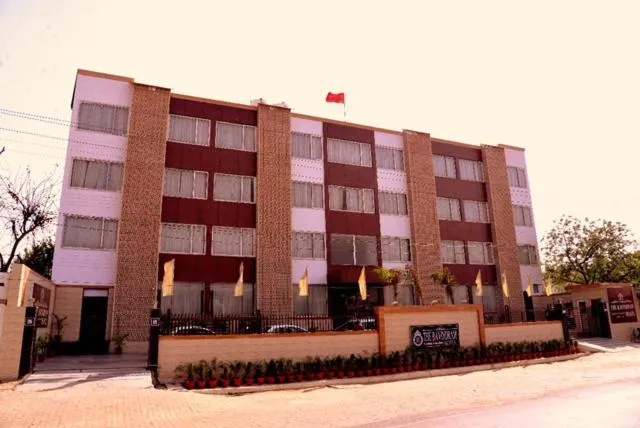 Text overlay in The Ravindram Hotel