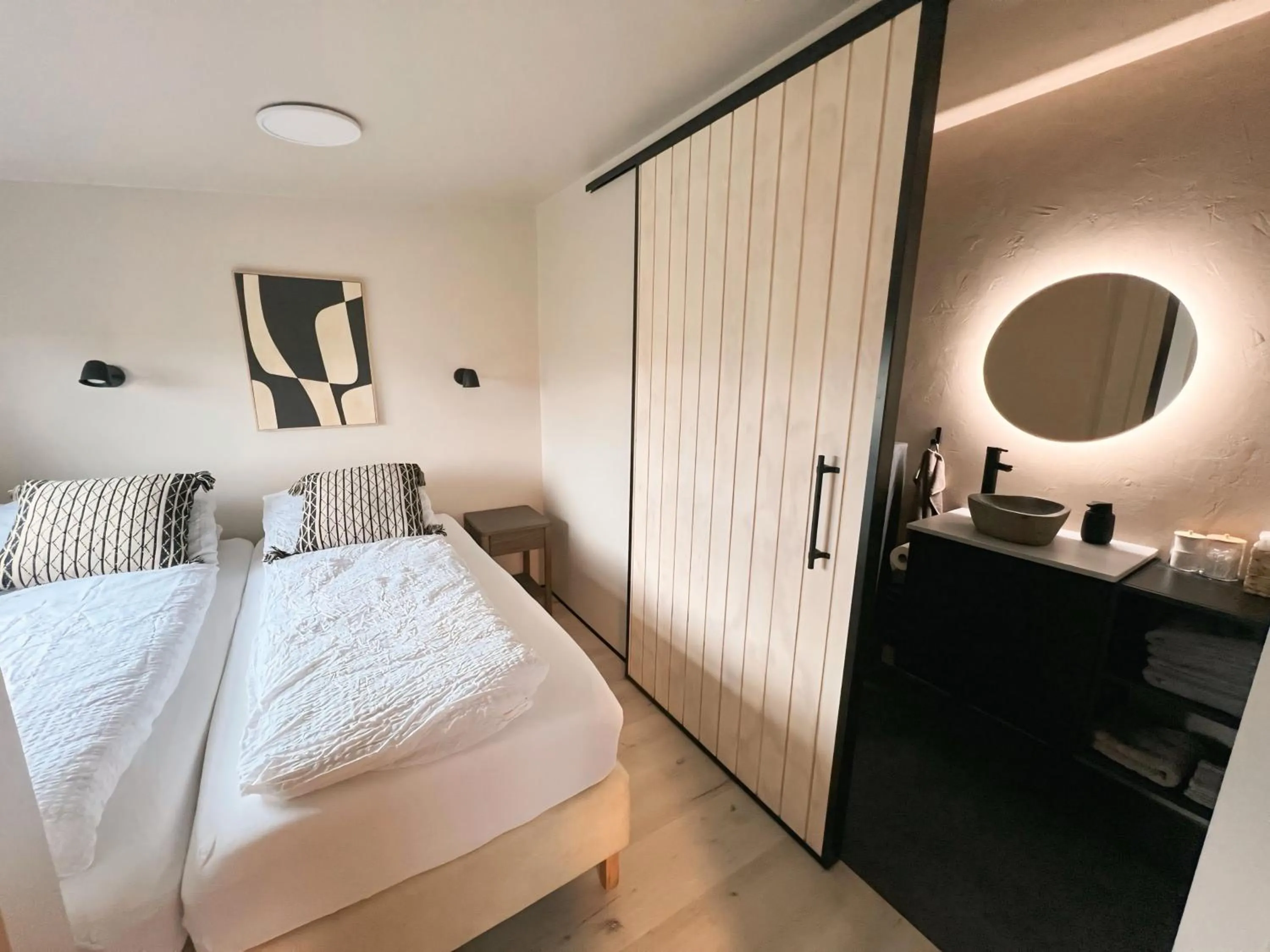 Bed in Garður Apartments