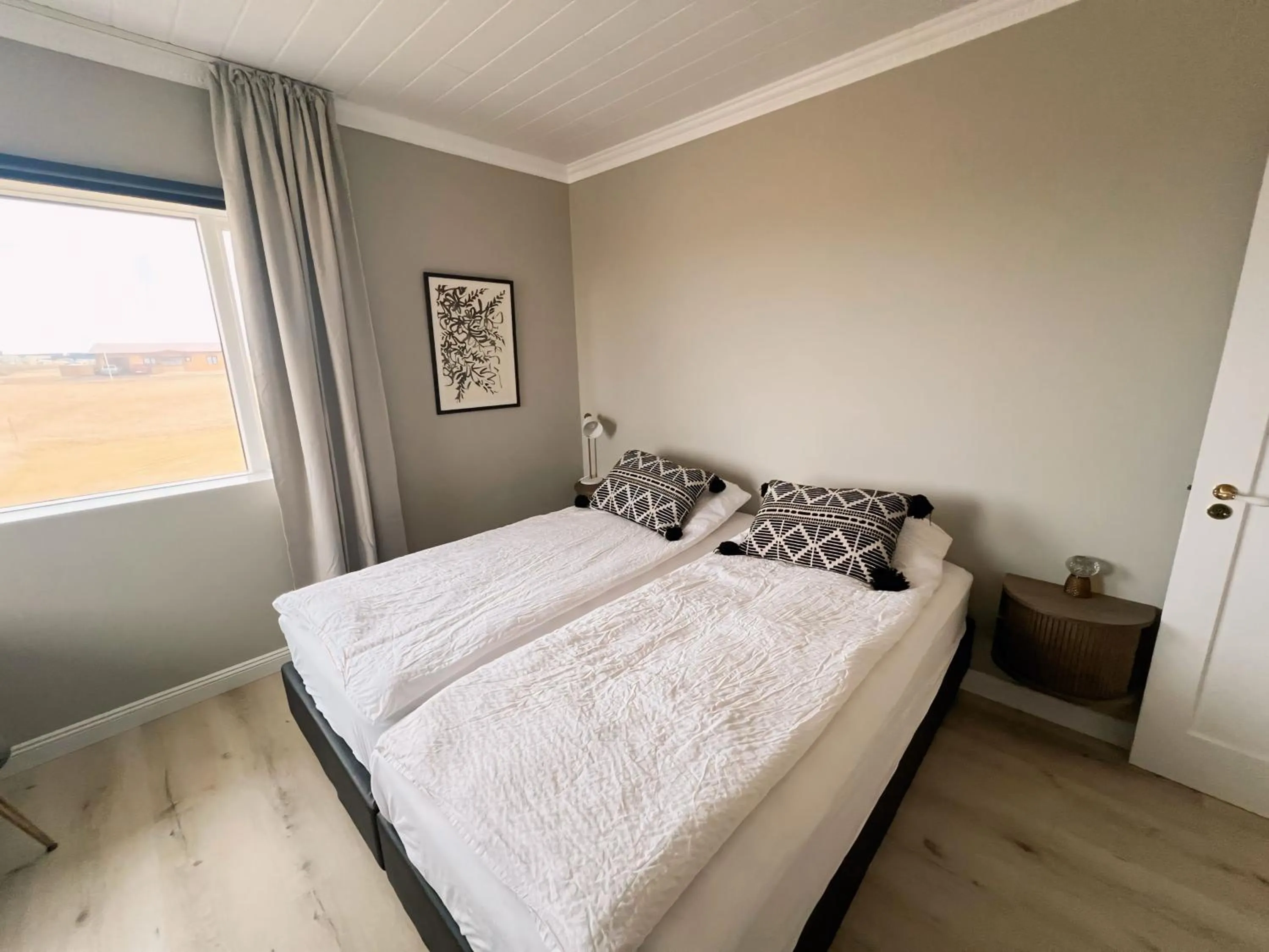 Bed in Garður Apartments