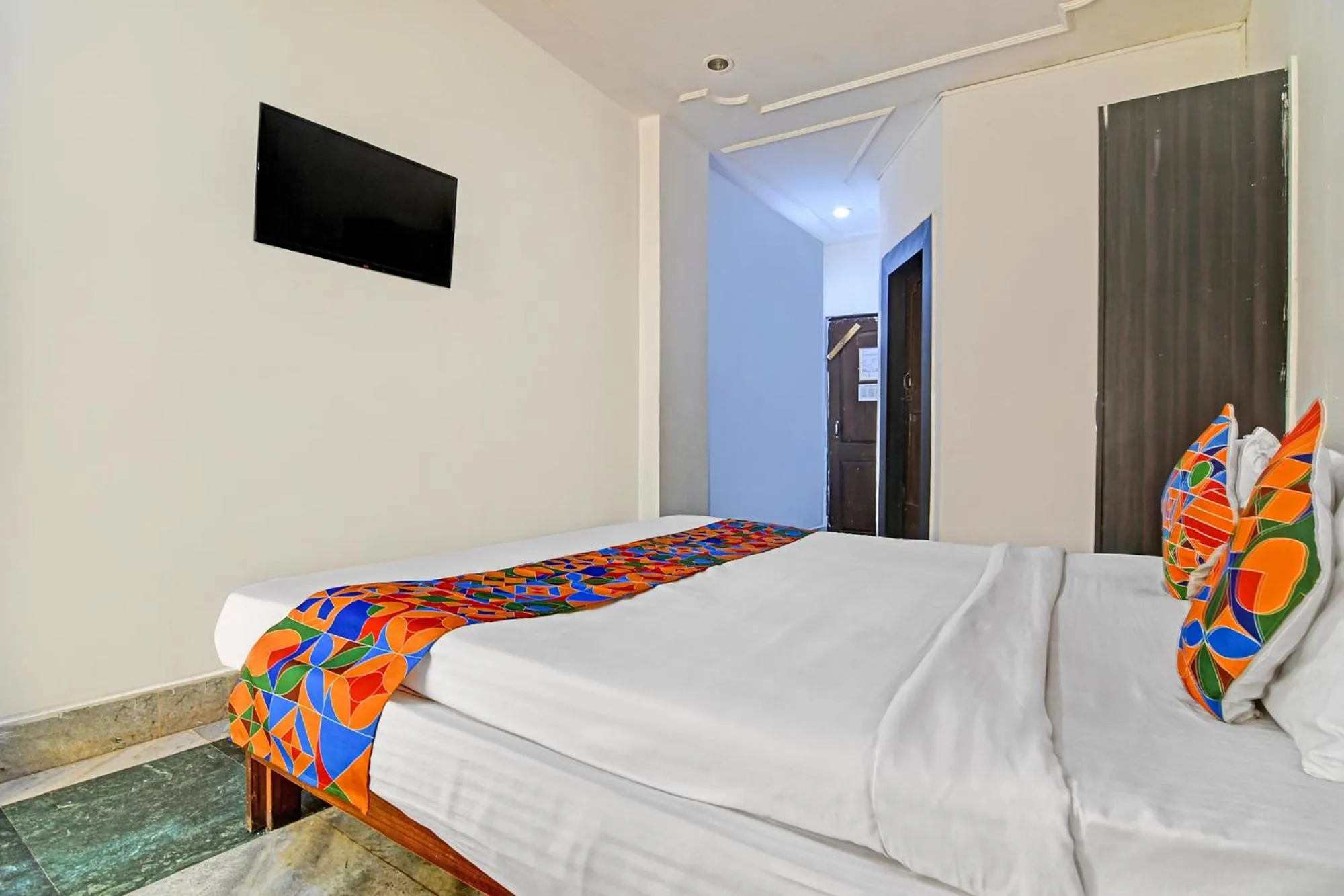 Bed in FabHotel Sai Sagar Residency