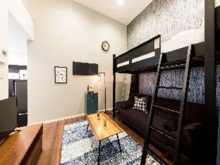 Bed in TRIP POD KOMONDO-MACHI