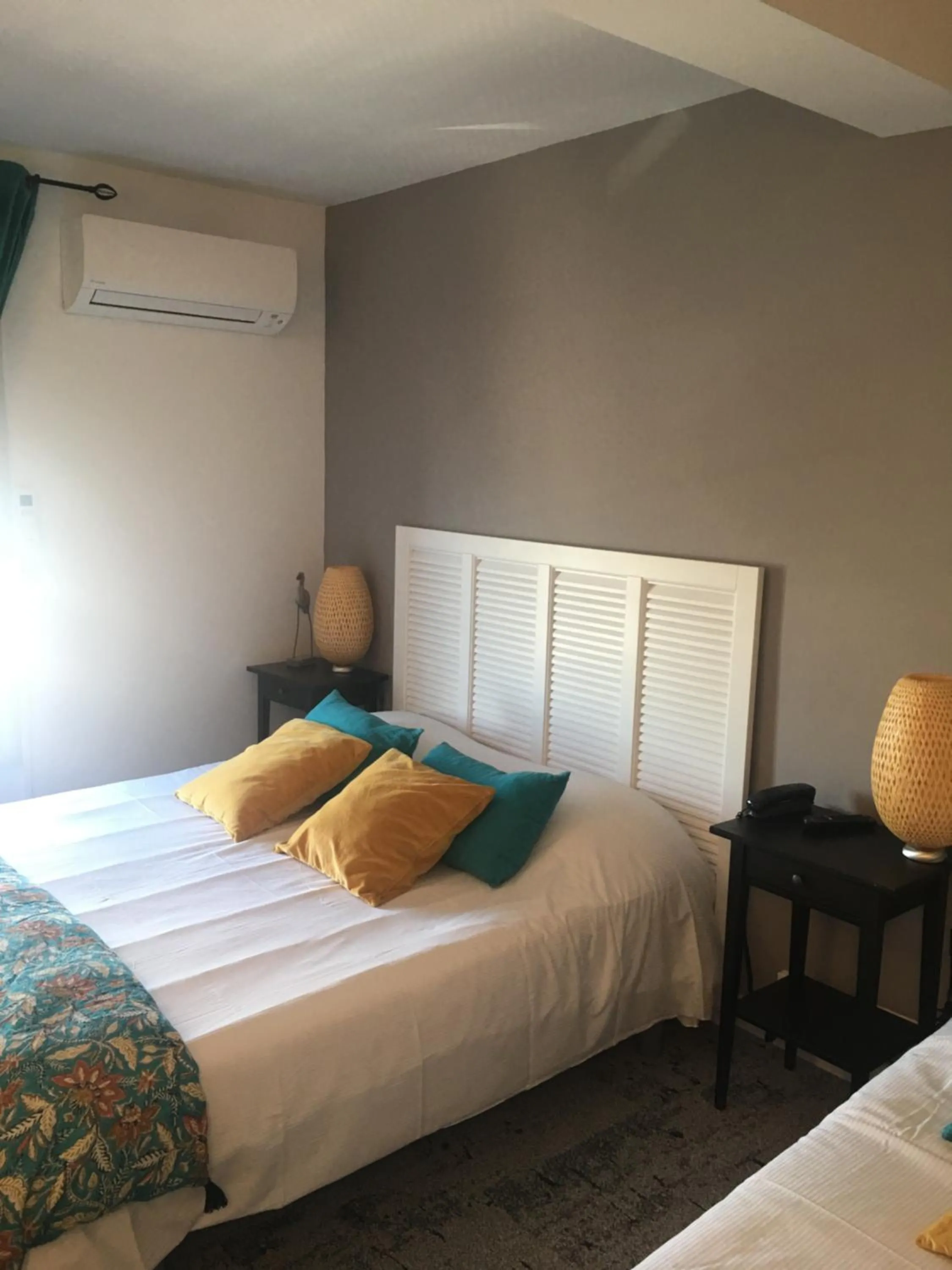 Bed in Hôtel Le Mistral