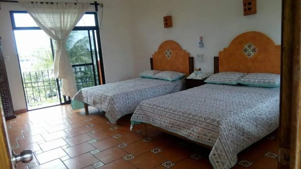 Bed in Hotel Villa Palmeras