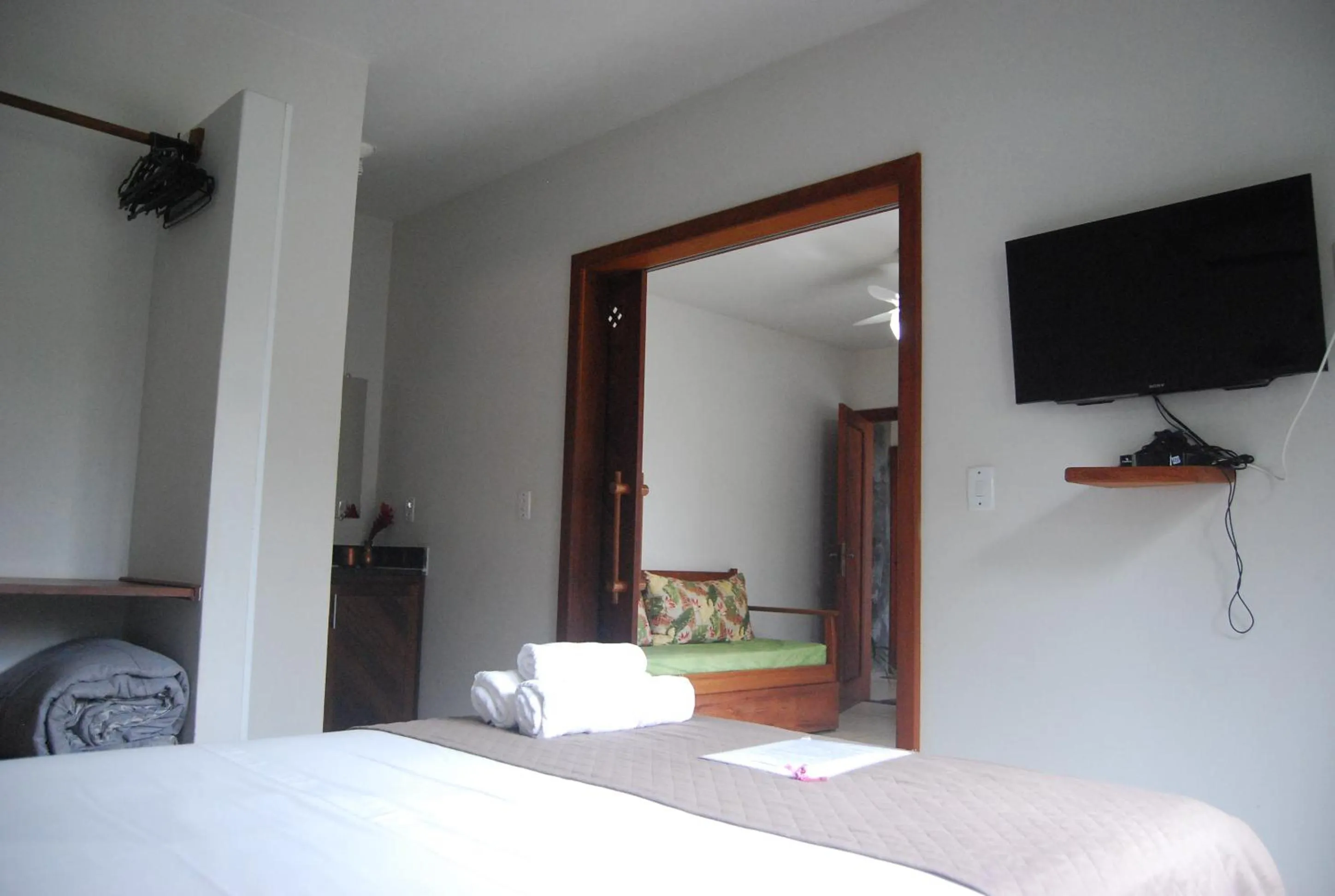 Communal lounge/ TV room, Bed in Bahia Bonita Flat