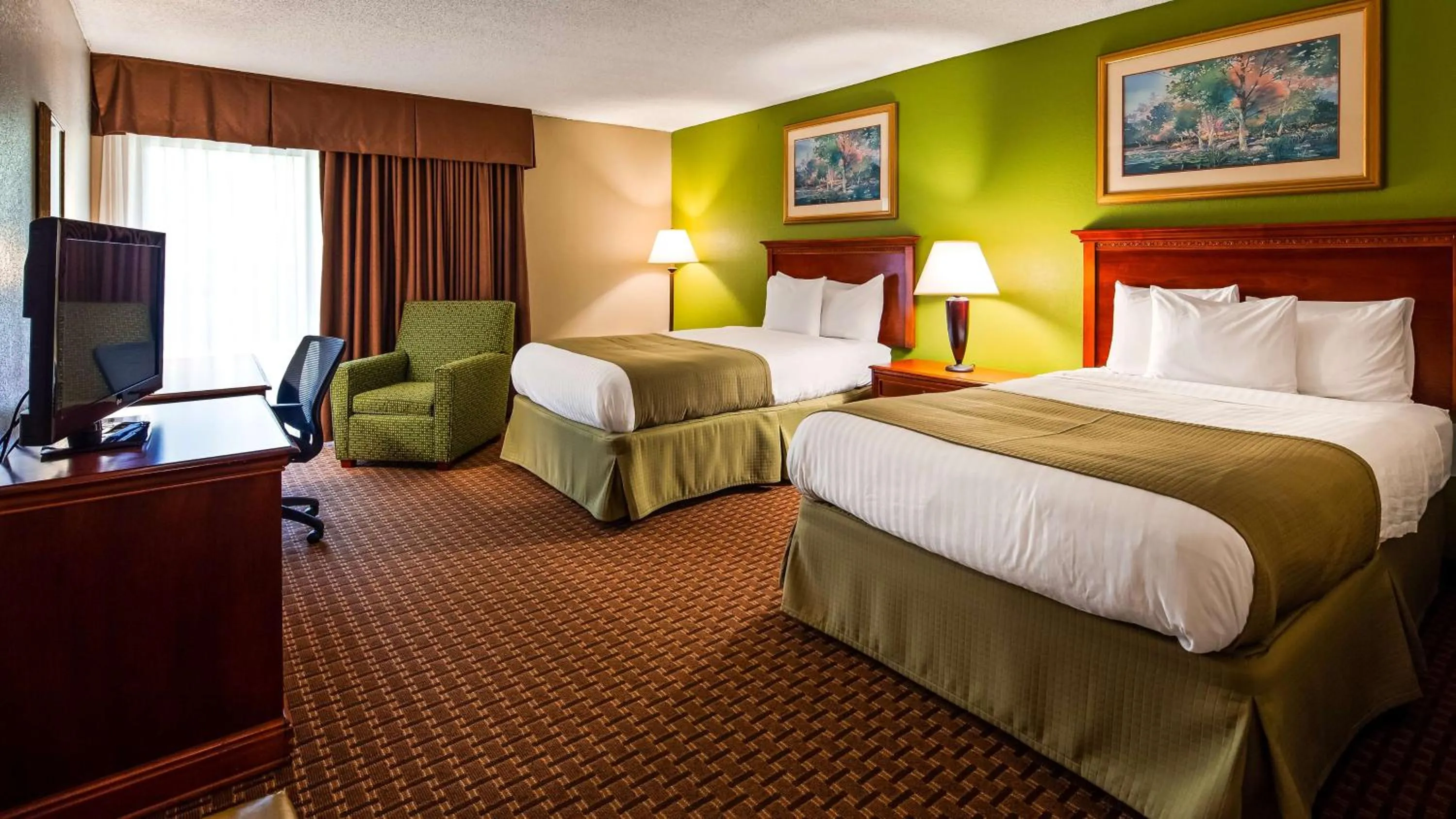 Photo of the whole room in SureStay Plus Hotel by Best Western Raleigh North Downtown