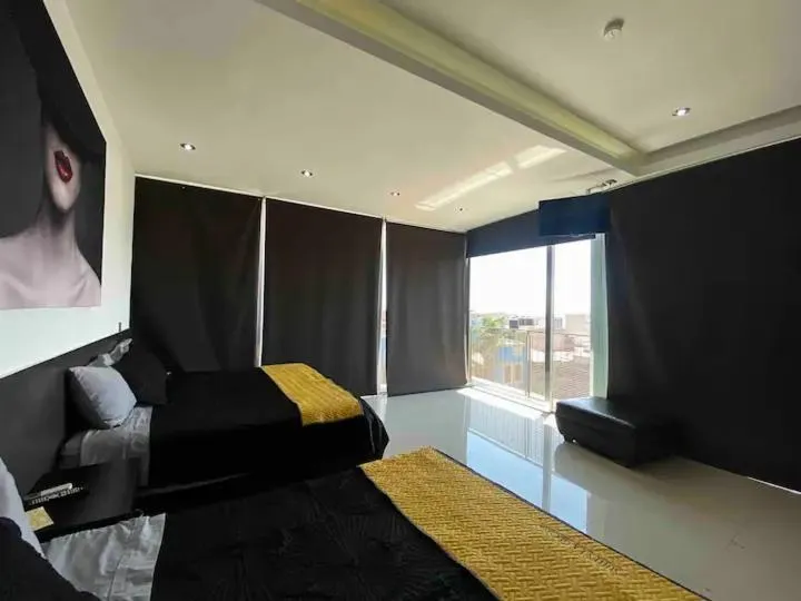 Photo of the whole room, Bed in Suites La Gloria Alojamiento independiente