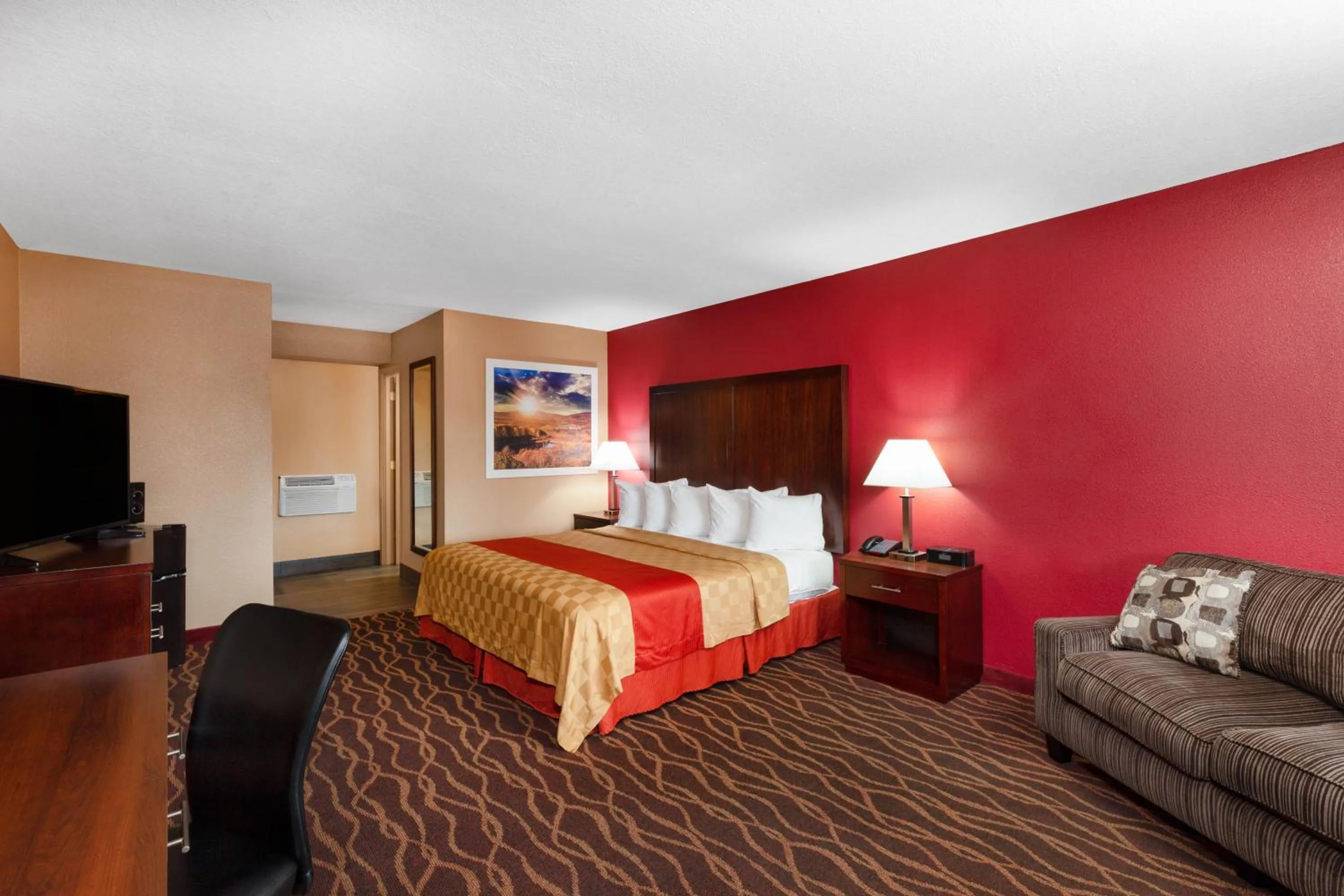 TV and multimedia, Bed in Rosewood Inn & Suites