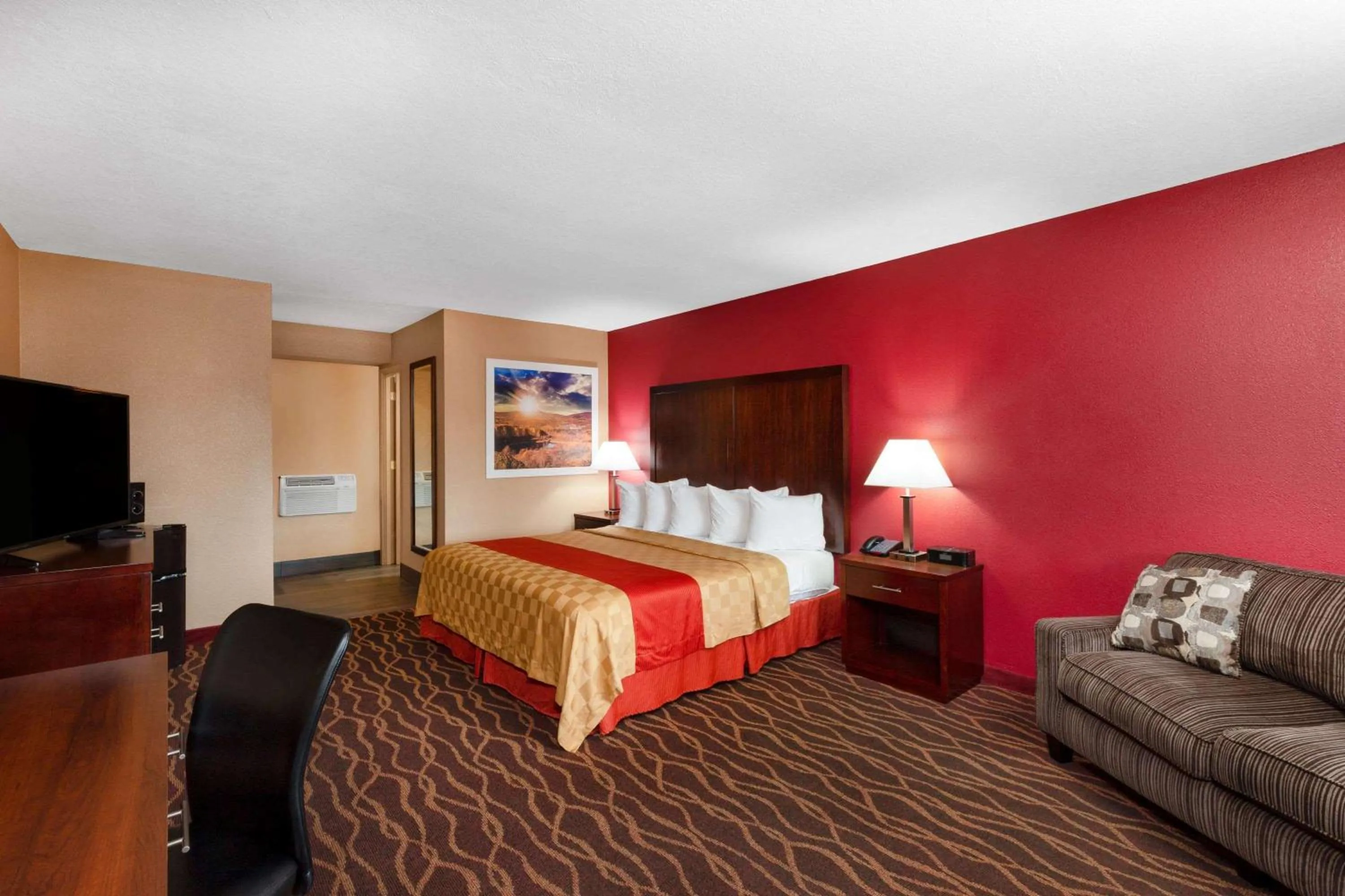 Photo of the whole room, Bed in Rosewood Inn & Suites