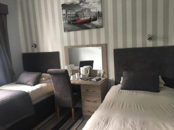 Bed in The Marquis Inn