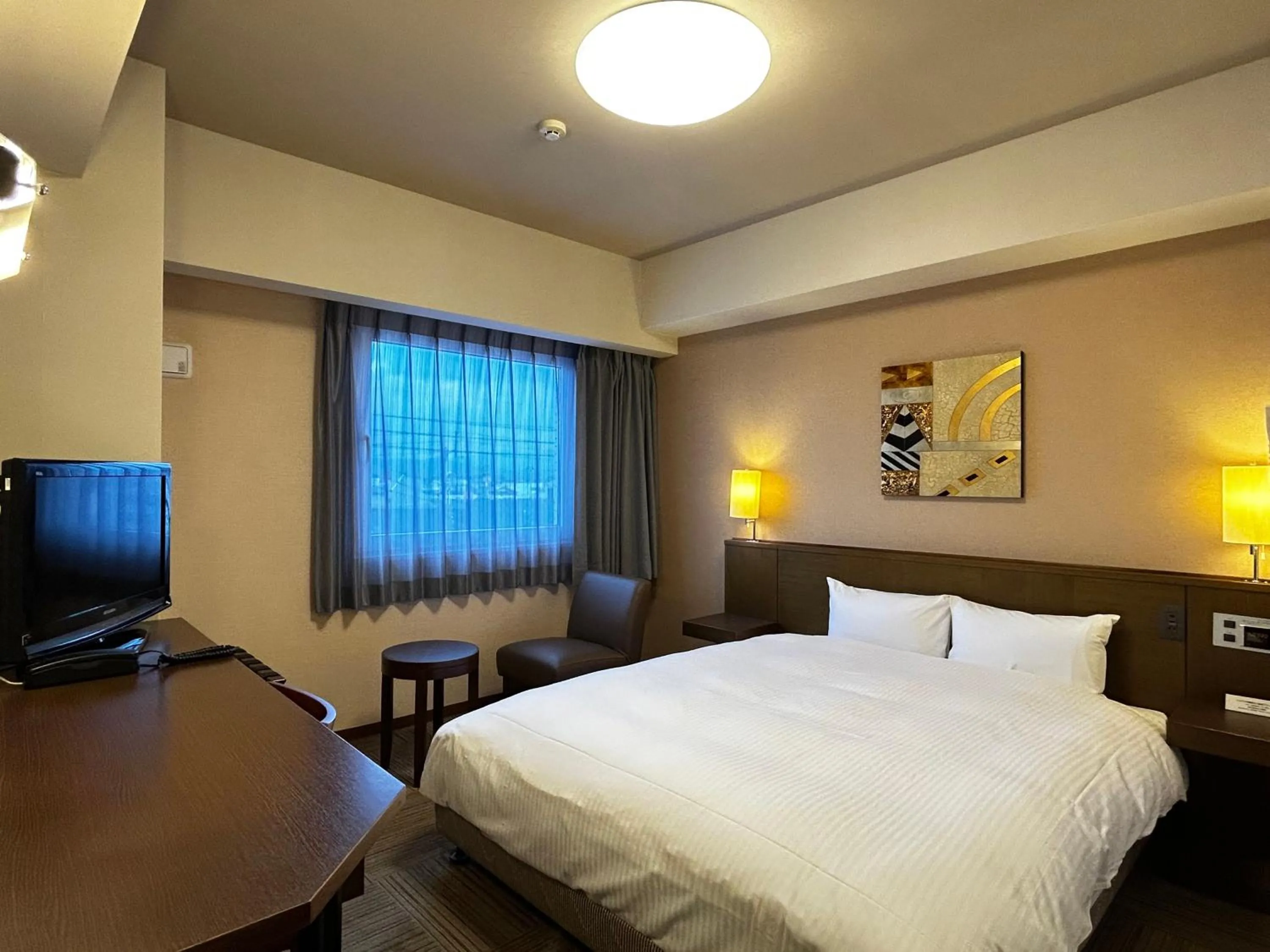 Photo of the whole room, Bed in Hotel Route-Inn Marugame