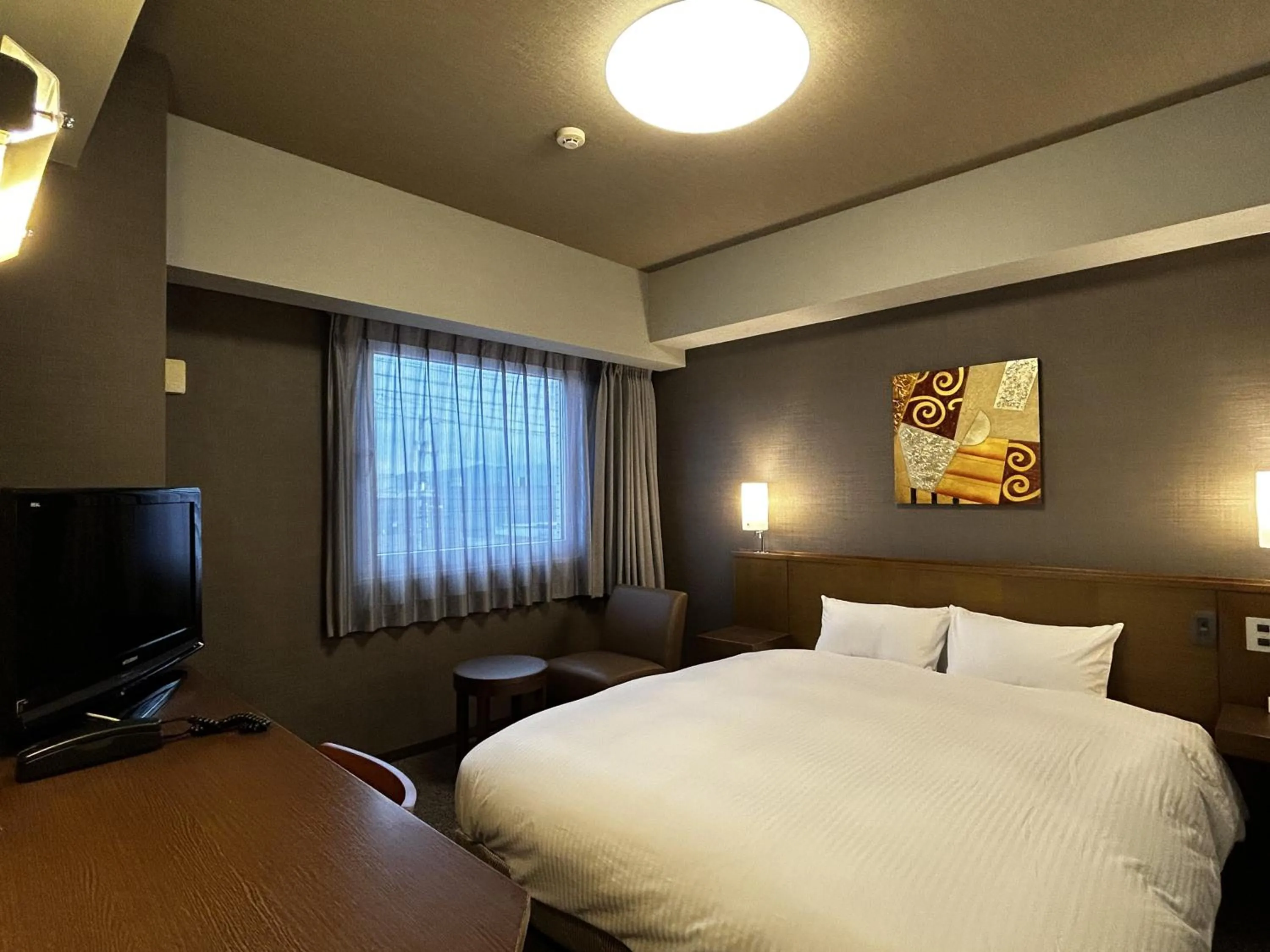 Photo of the whole room, Bed in Hotel Route-Inn Marugame