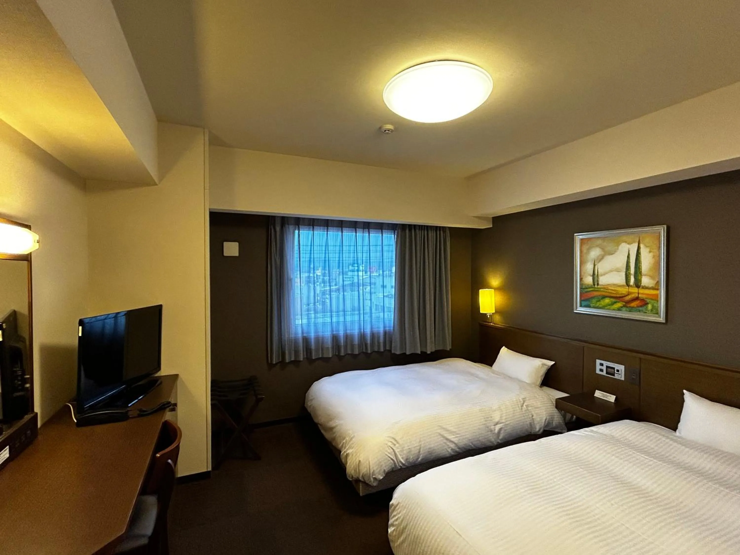 Photo of the whole room, Bed in Hotel Route-Inn Marugame