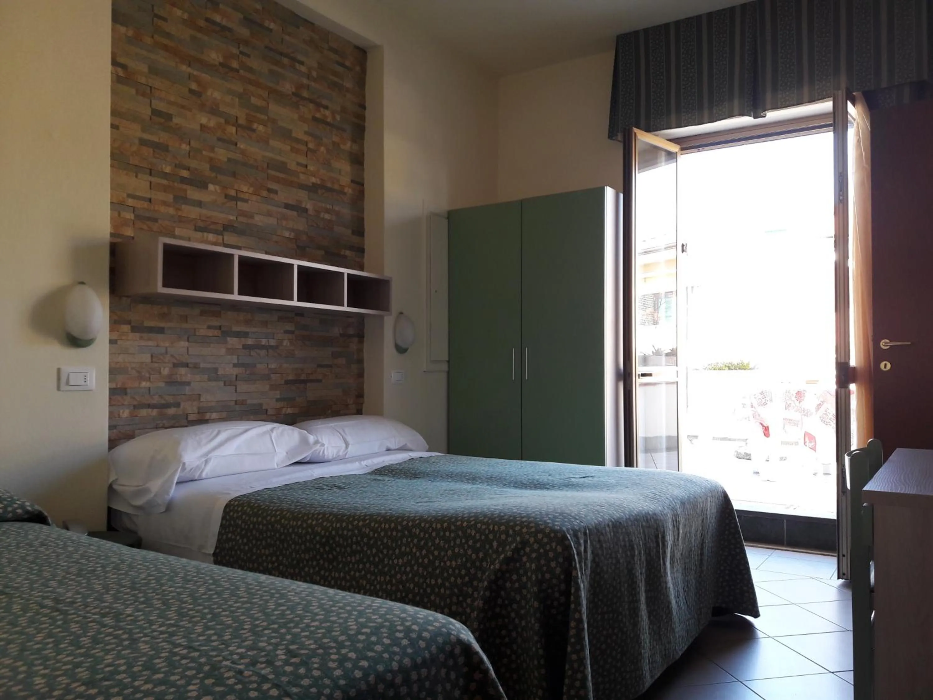 Bed in Hotel Mariani