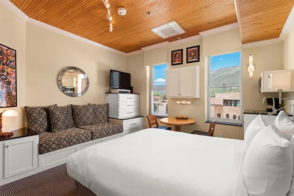Photo of the whole room, Bed in Independence Square 305, Remodeled, 3rd Floor Hotel Room in Aspen's Best Location