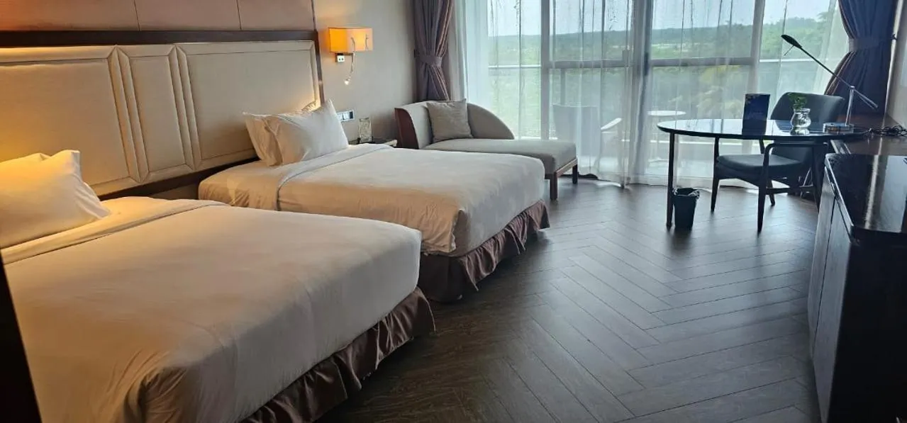 Bed in Forest City Golf Hotel