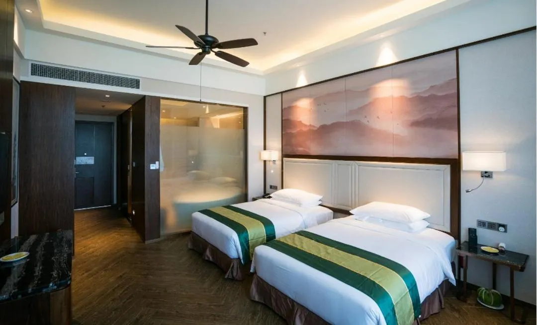 Bed in Forest City Golf Hotel