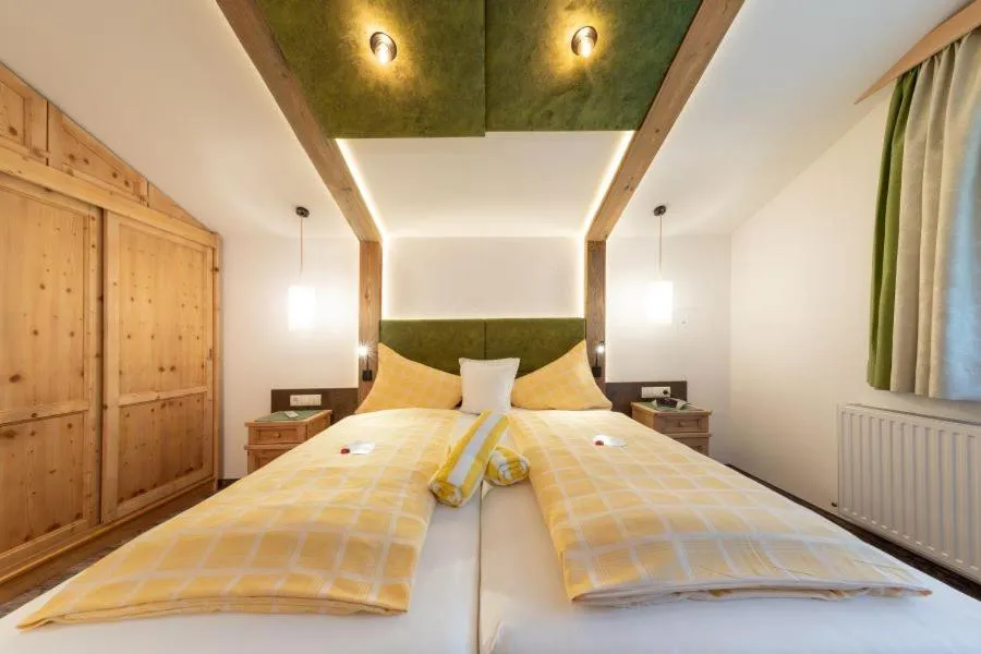 Bed in Hotel Sporthof Austria