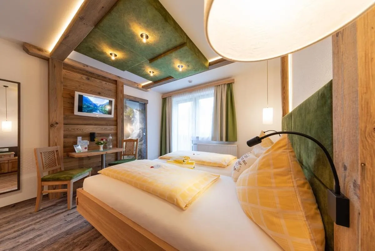 Bed in Hotel Sporthof Austria