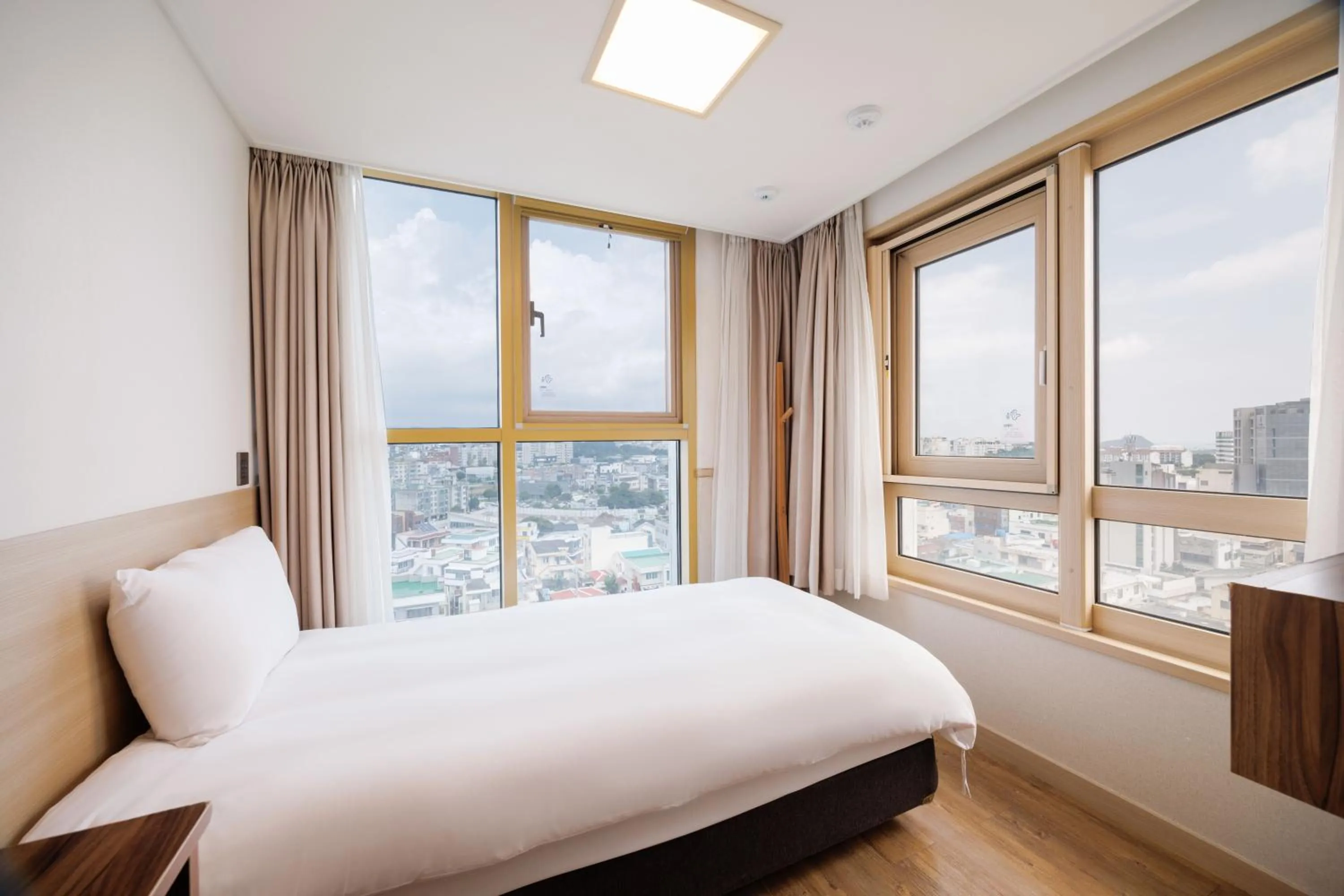 Bedroom, Bed in Kenny Stay Jeju Seogwipo