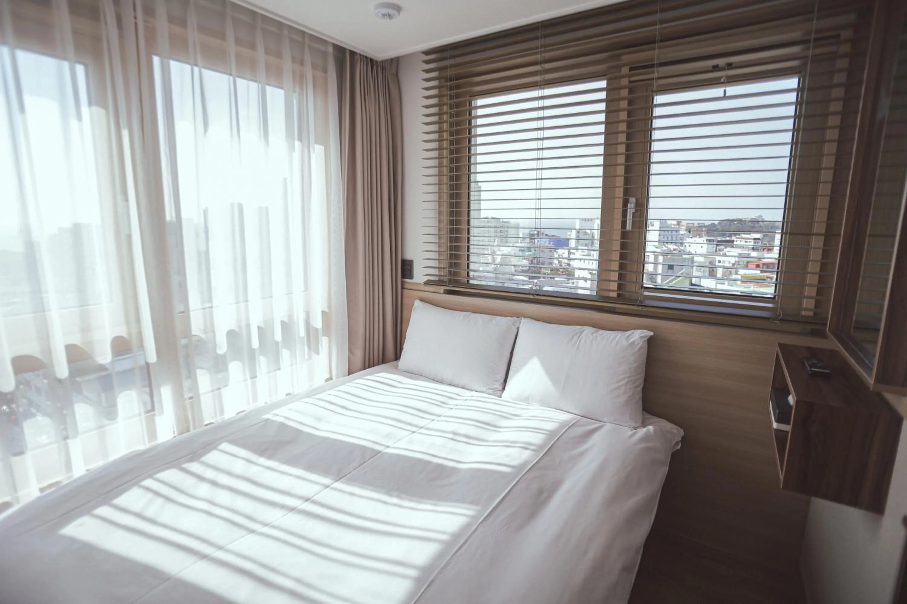 Bed in Kenny Stay Jeju Seogwipo