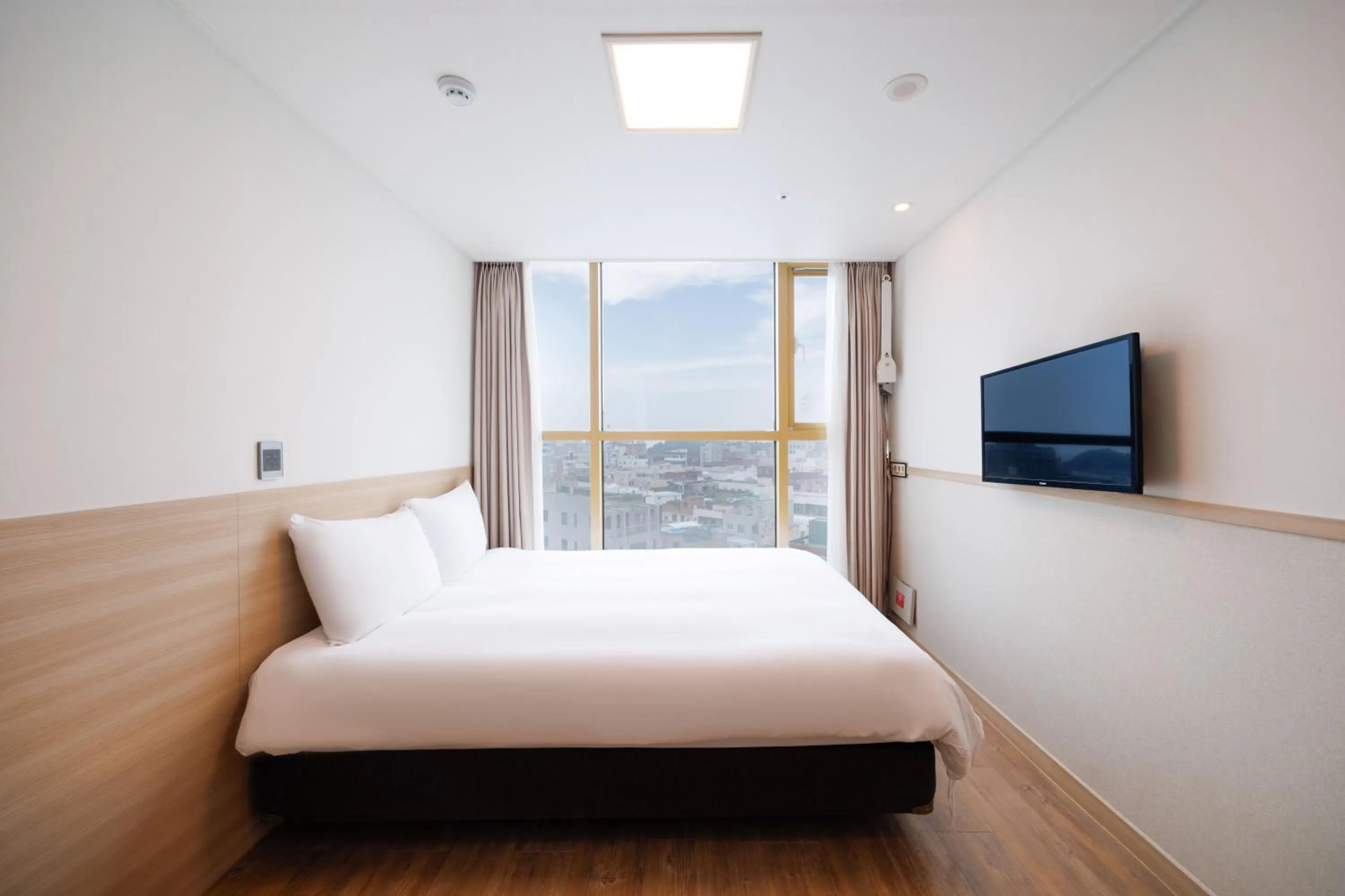 Bed in Kenny Stay Jeju Seogwipo