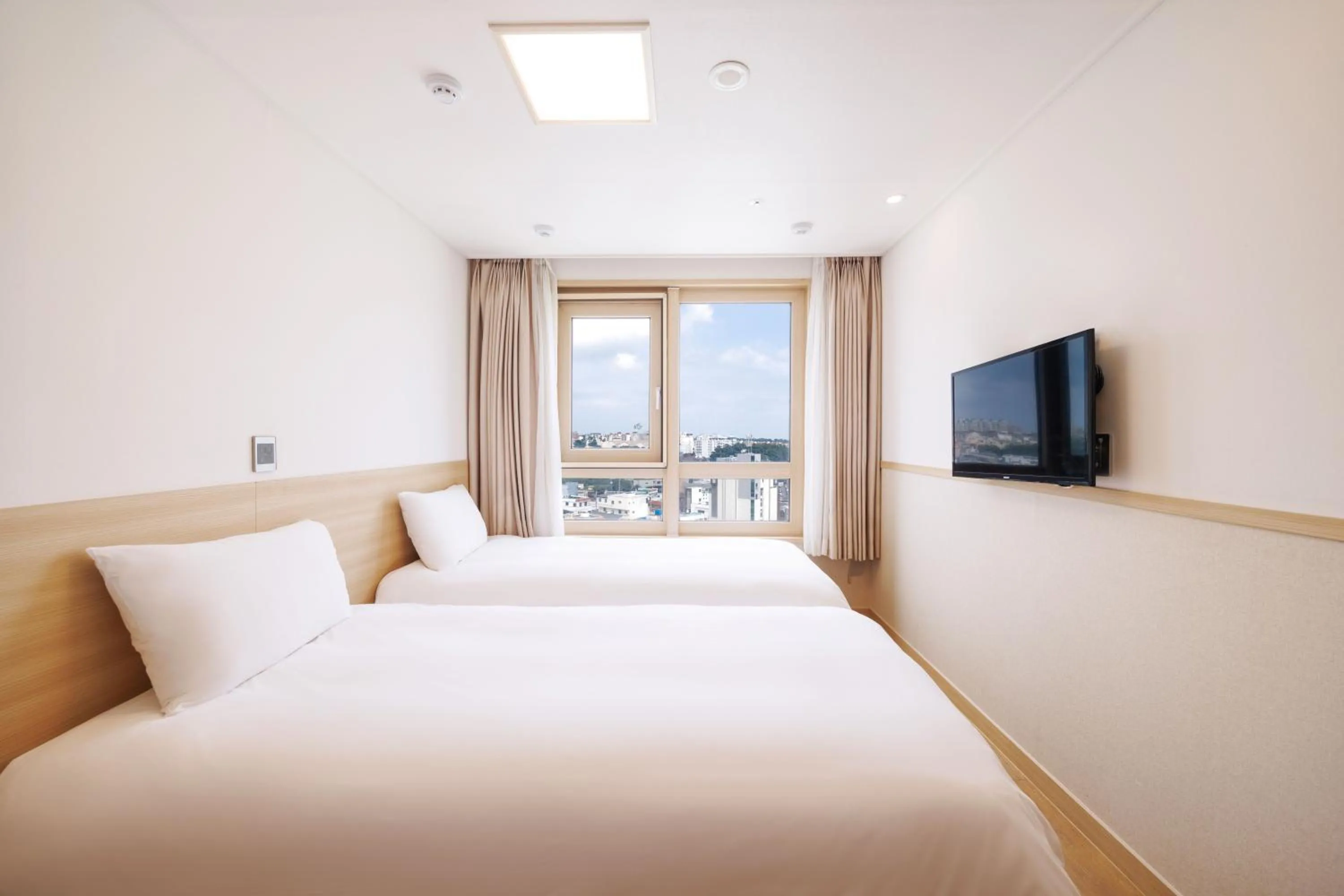 Bed in Kenny Stay Jeju Seogwipo