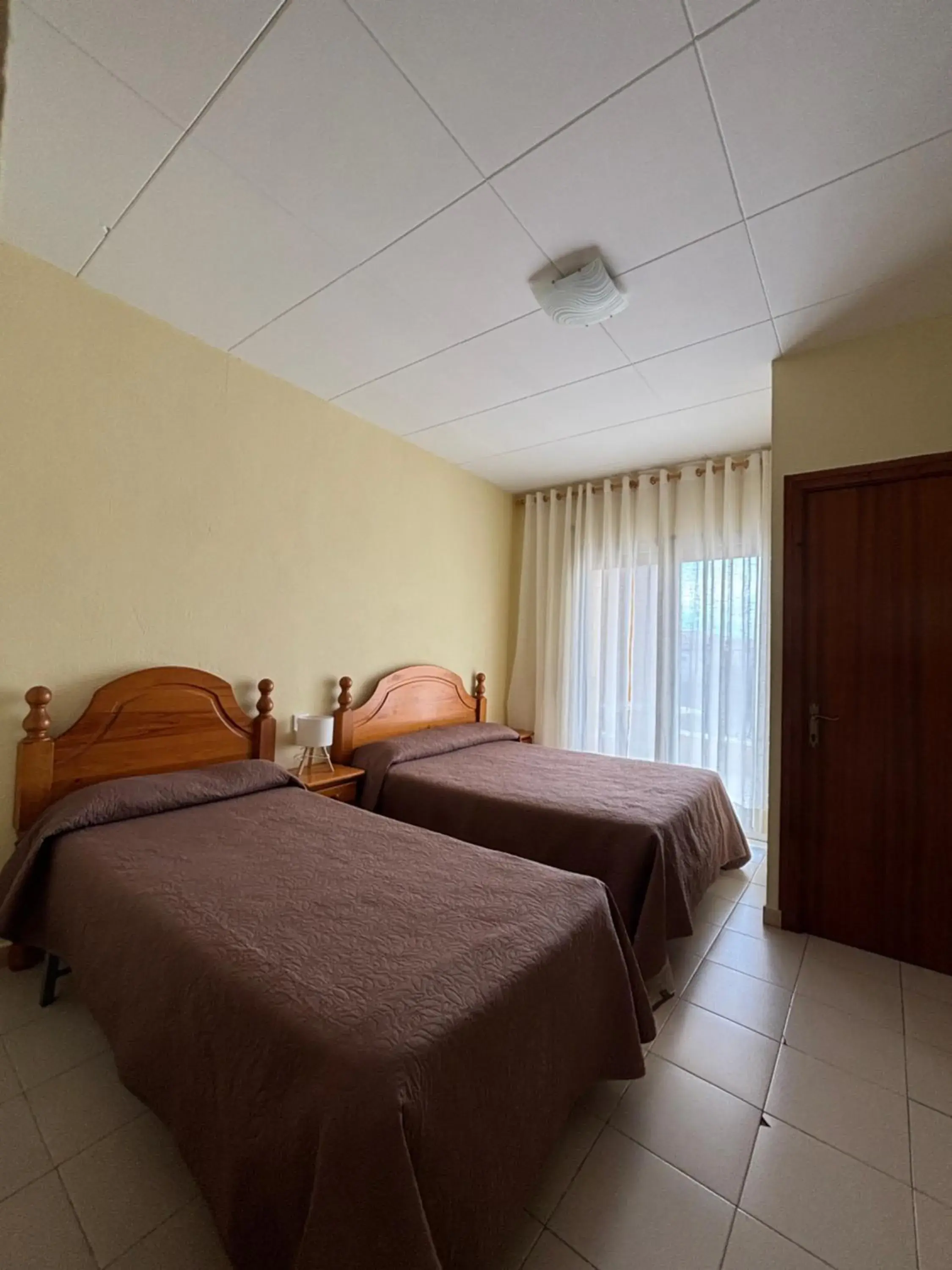 Triple Room with Balcony in Hostal Avi Pep Triple Room with Balcony in Hostal Avi Pep