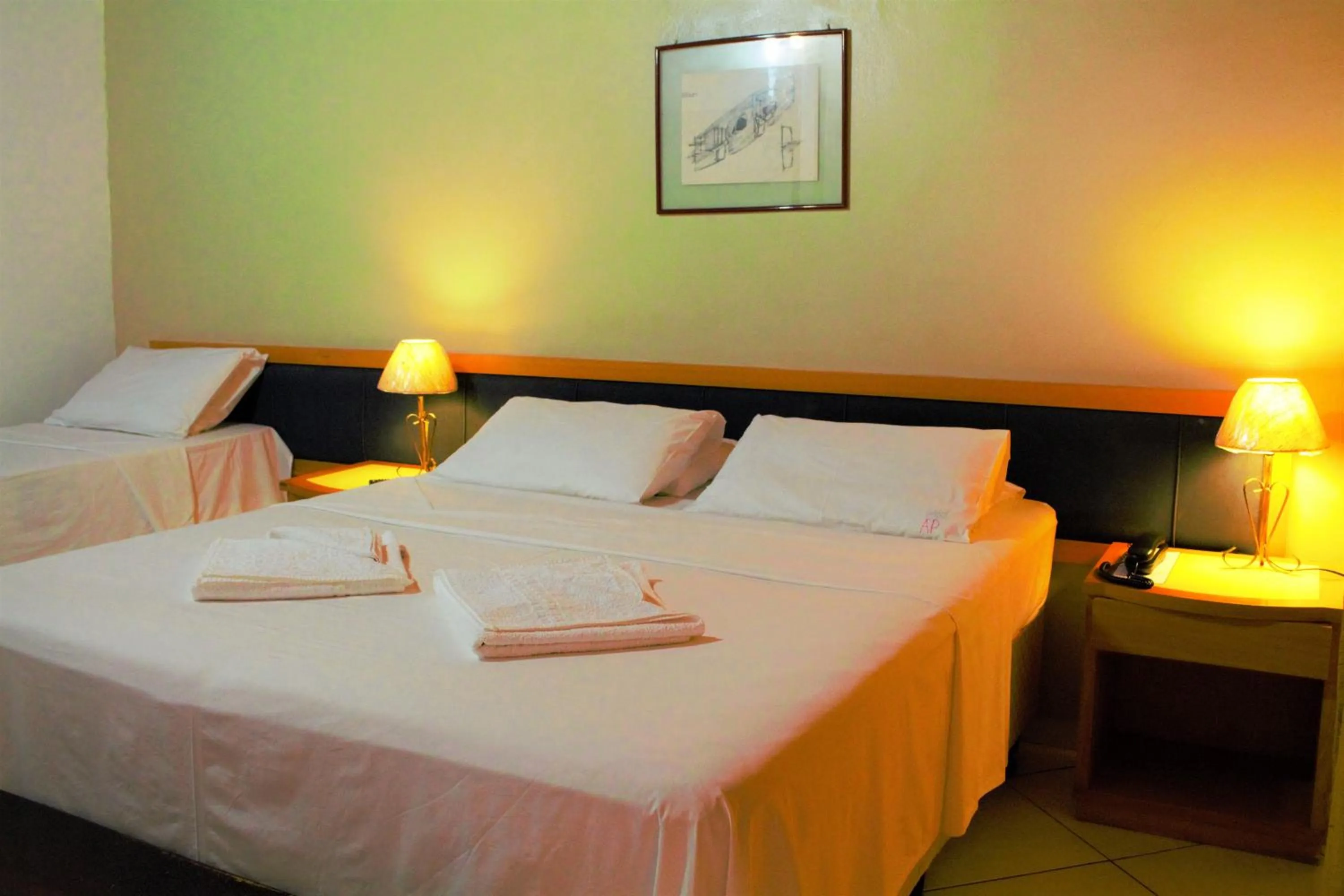 Bed in Pousada Aldeia Portuguesa