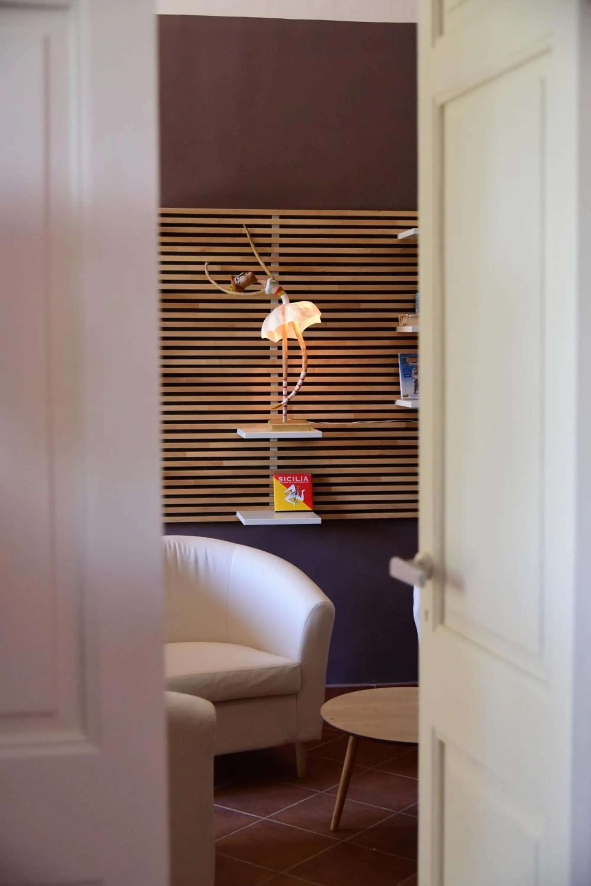 Communal lounge/ TV room, Bed in Giardino Arancio