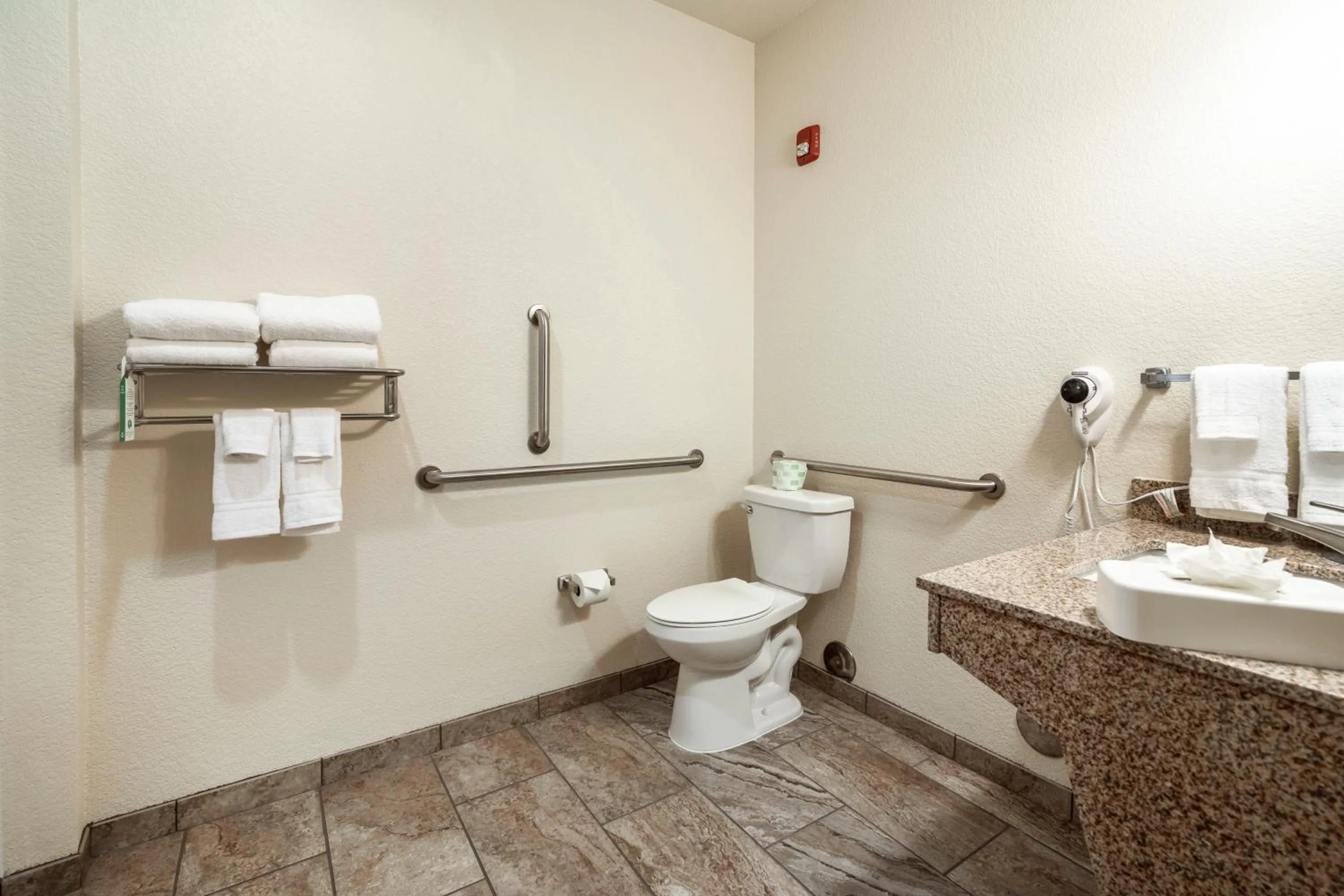 Toilet in Cobblestone Hotel & Suites - Victor
