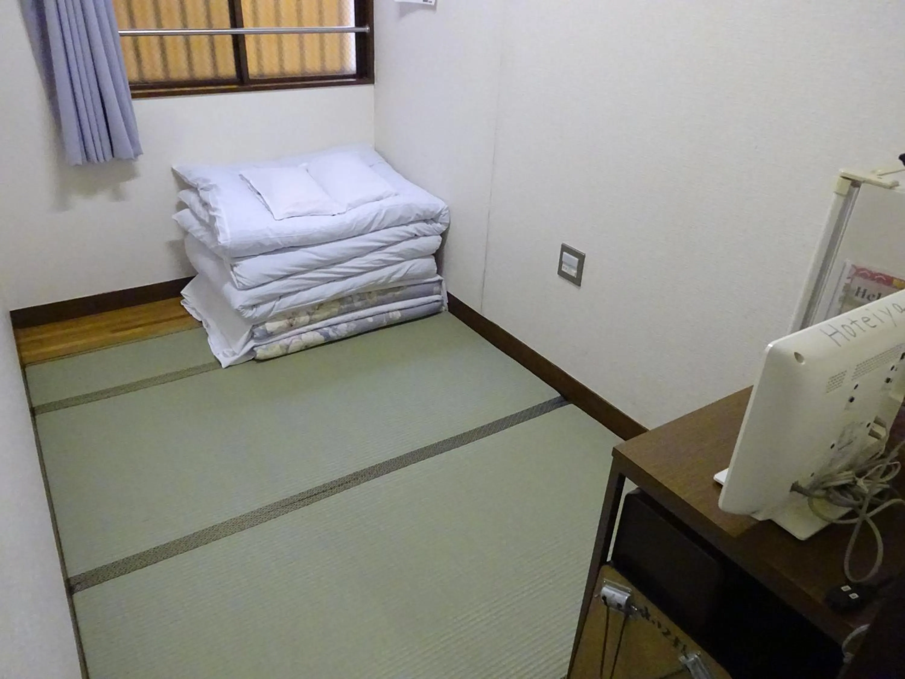 Photo of the whole room, Bed in Economy Hotel Hoteiya