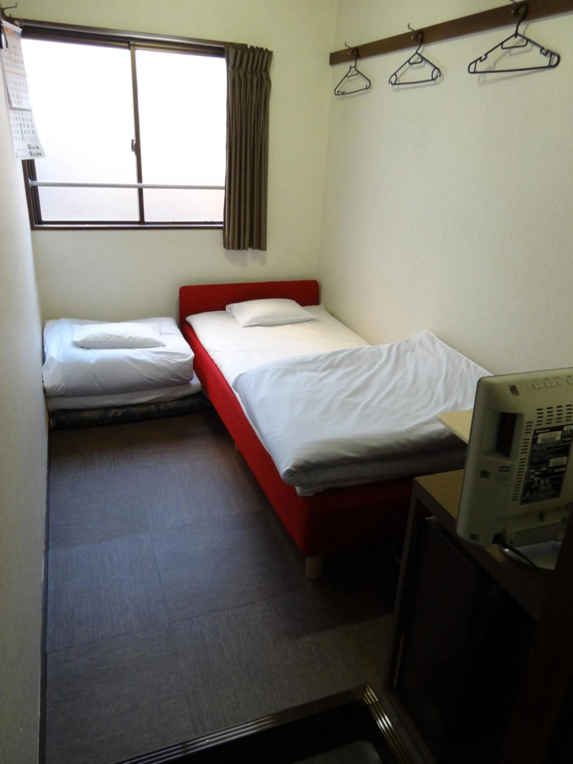 Photo of the whole room, Bed in Economy Hotel Hoteiya