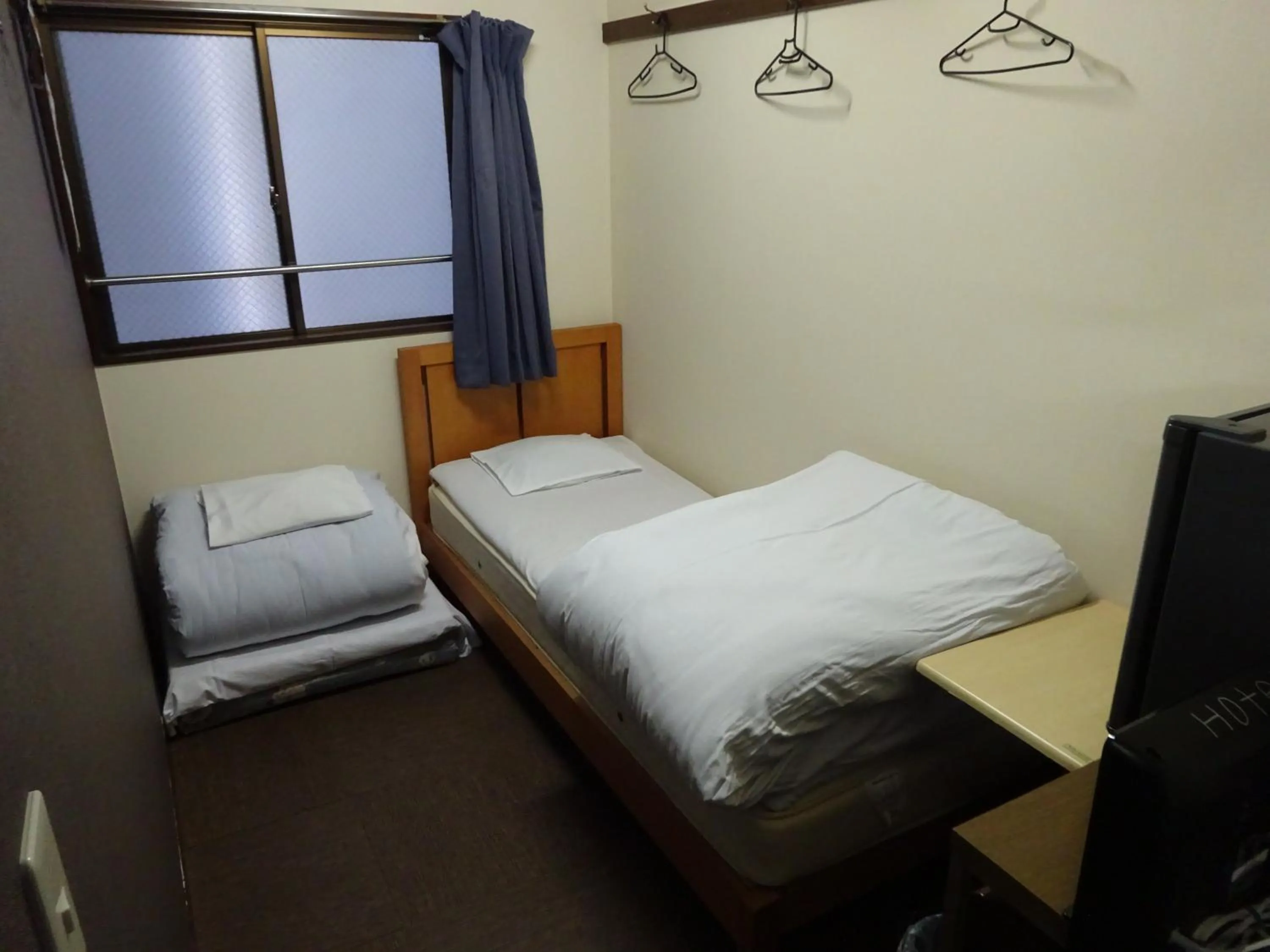 Photo of the whole room, Bed in Economy Hotel Hoteiya