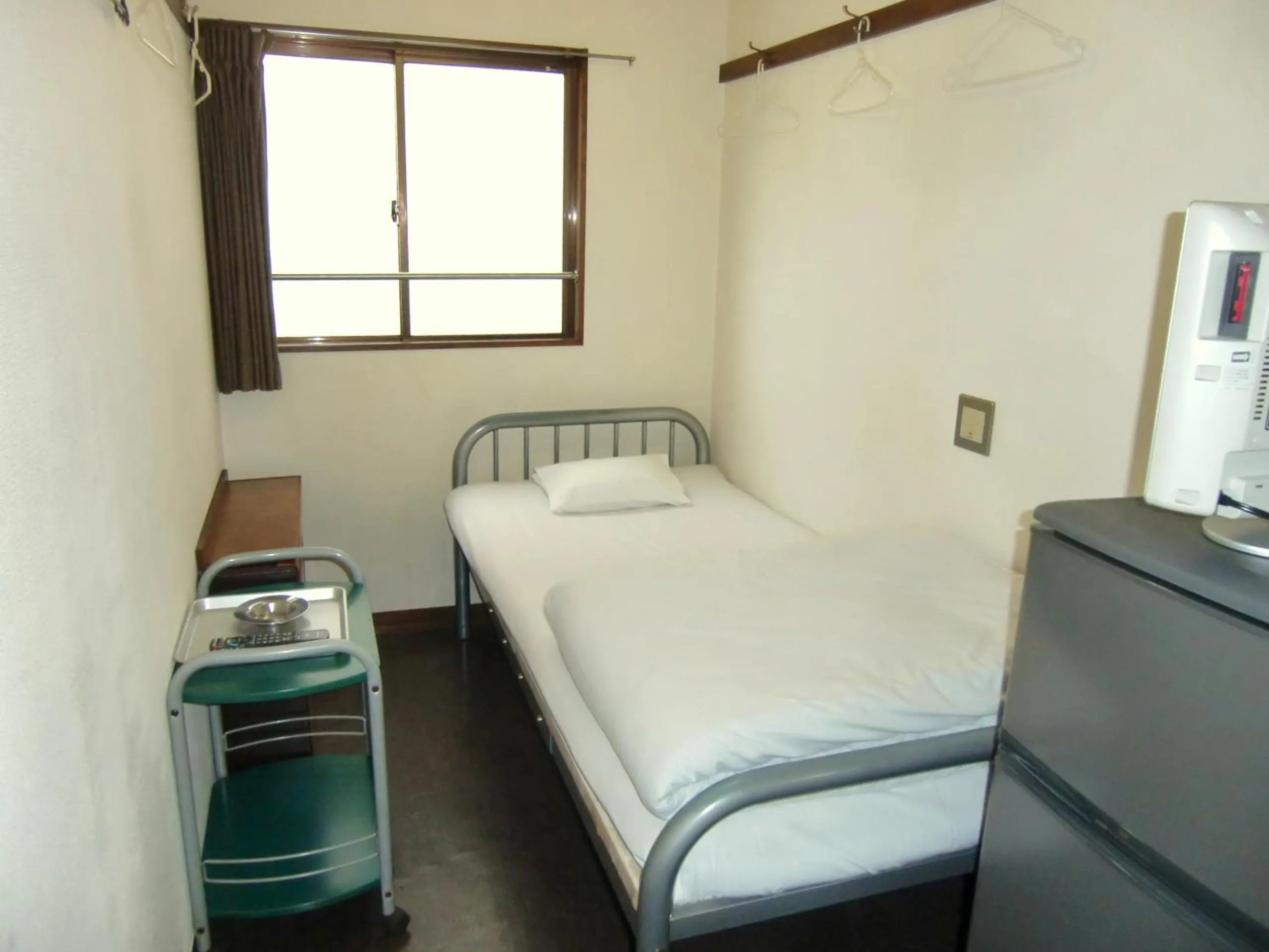 Bed in Economy Hotel Hoteiya