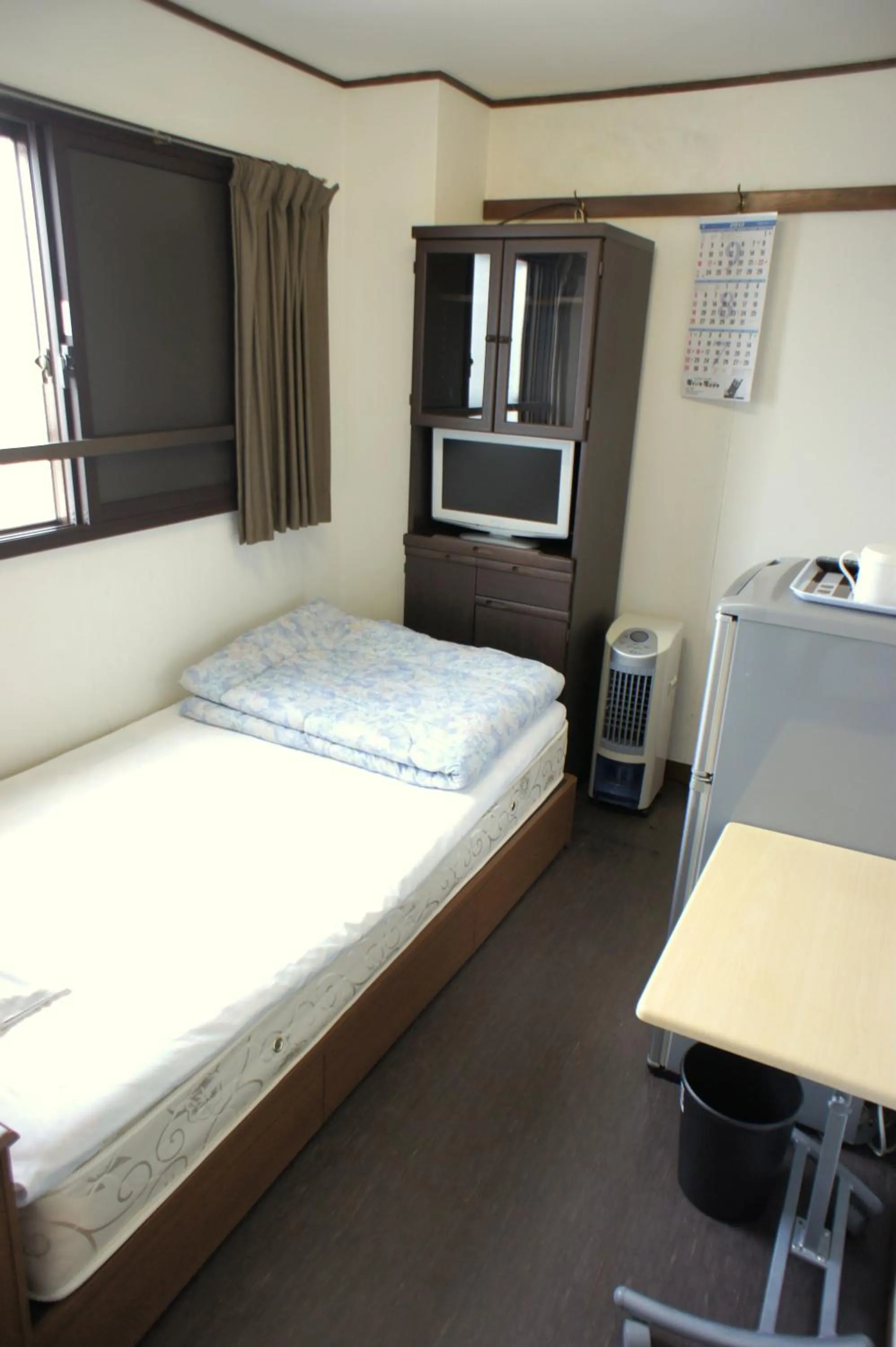 Photo of the whole room, Bed in Economy Hotel Hoteiya